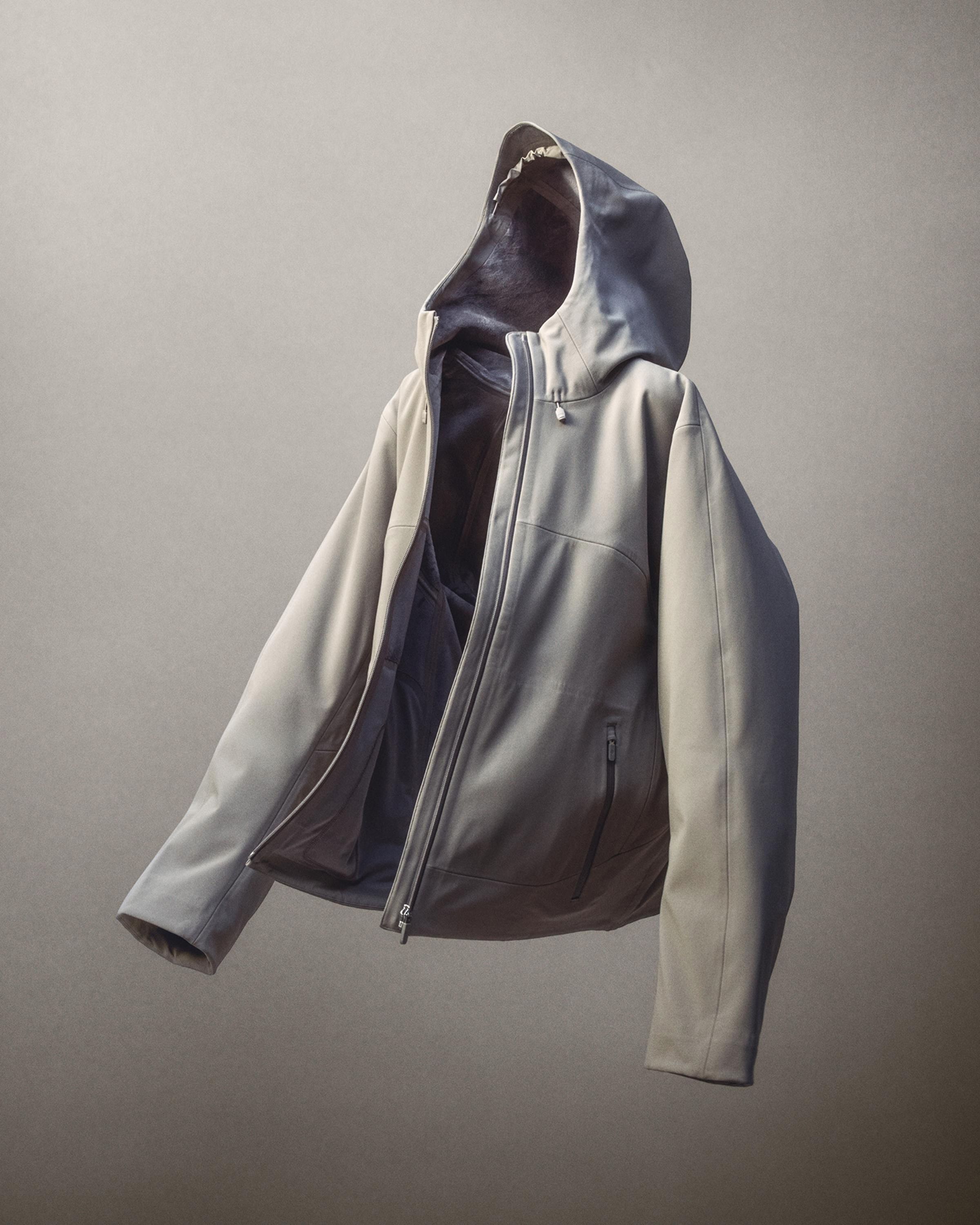 An image of the Cross Chill City-to-Trail Jacket unzipped and floating across a beige backdrop.