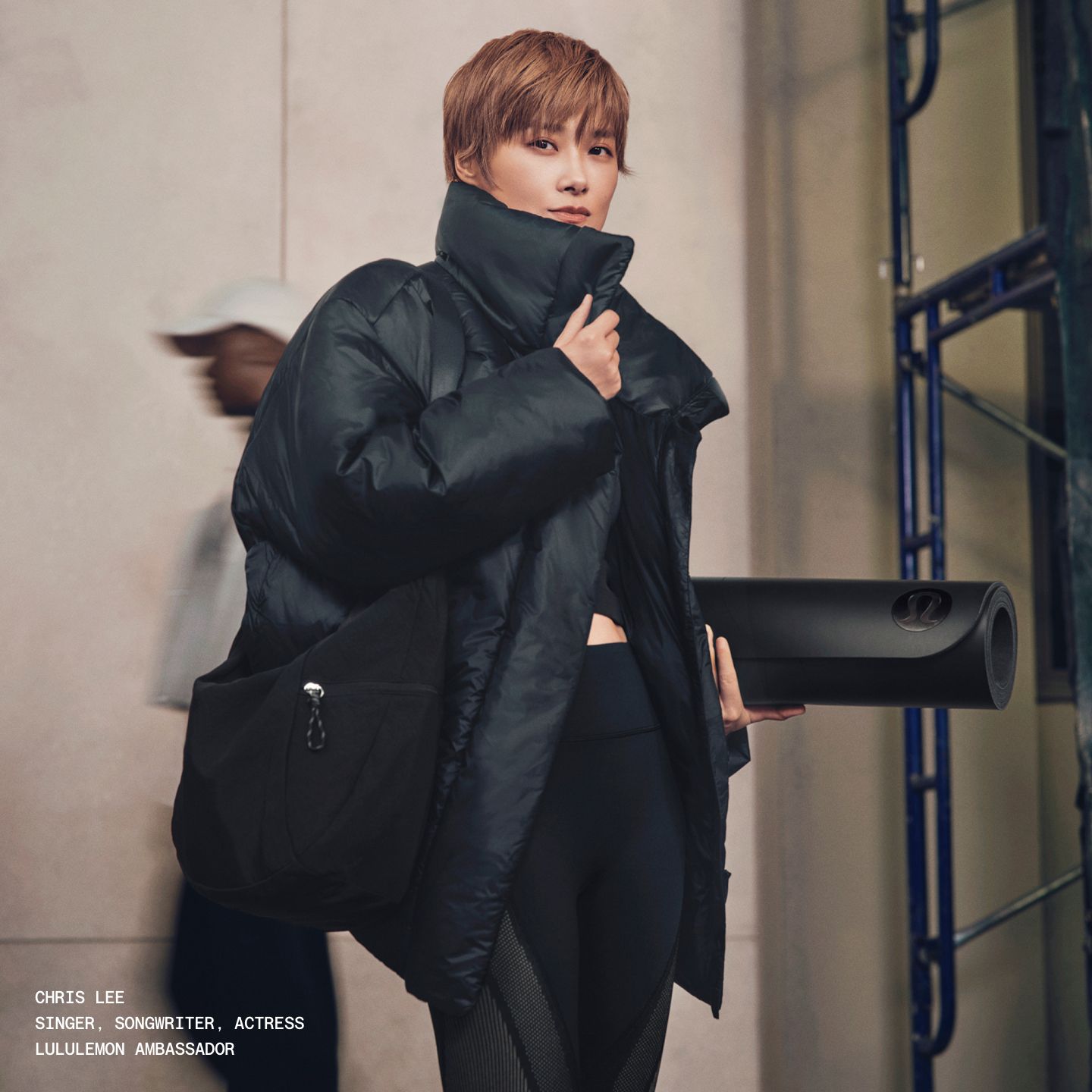 Chris Lee, lululemon Ambassador in the Featherweight Cropped Quilted Puffer in Black.