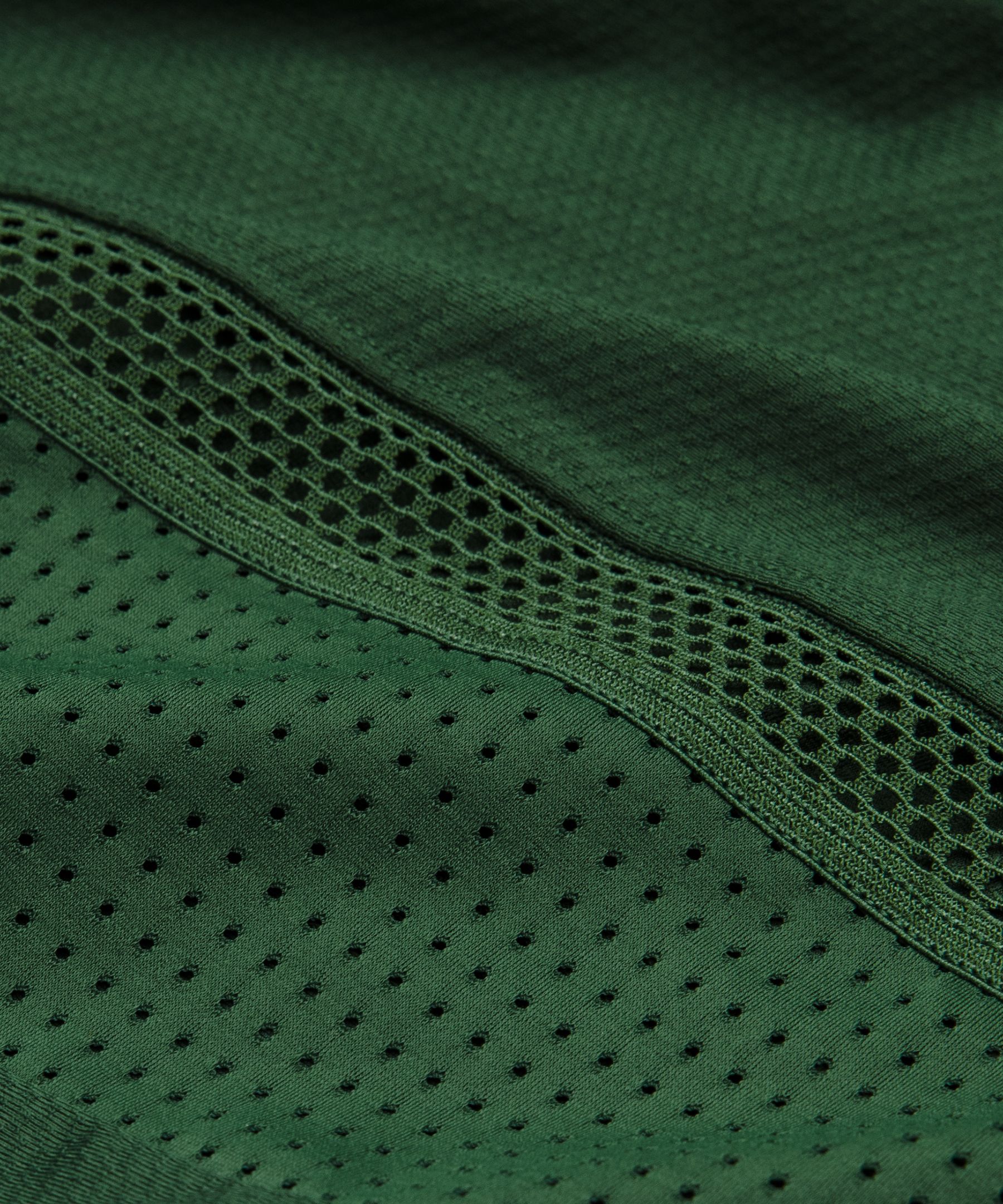 D&eacute;bardeur de tennis avec bandes en maille