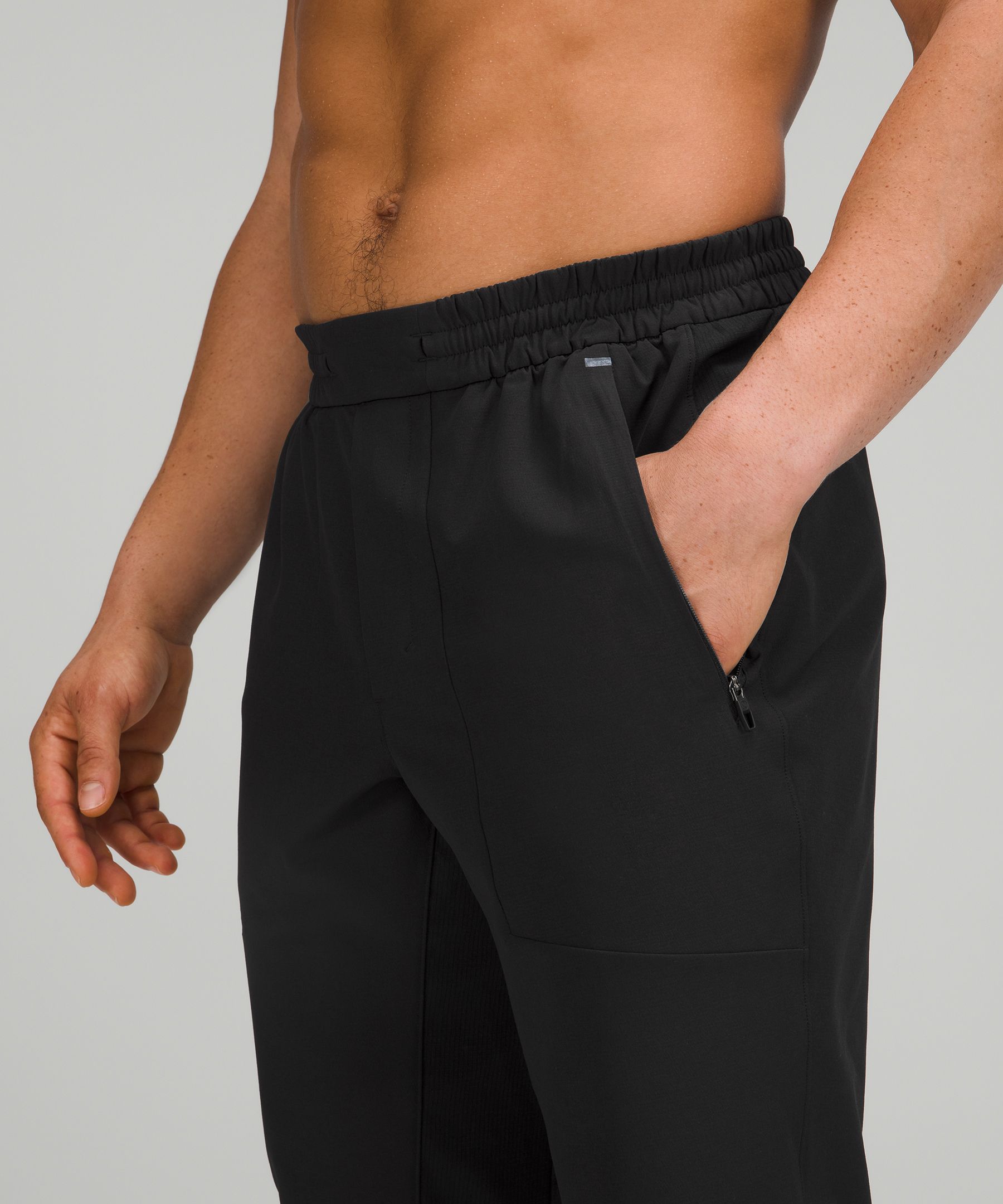 Black License to Train recycled fibre blend track pants, Lululemon