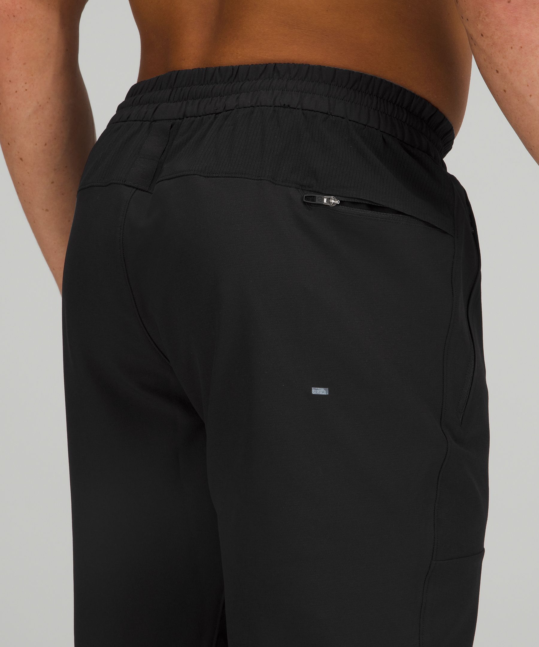 Black License to Train recycled fibre blend track pants, Lululemon