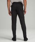 Pantalones Commission de corte ceñido, 81 cm *Warpstreme, solo online