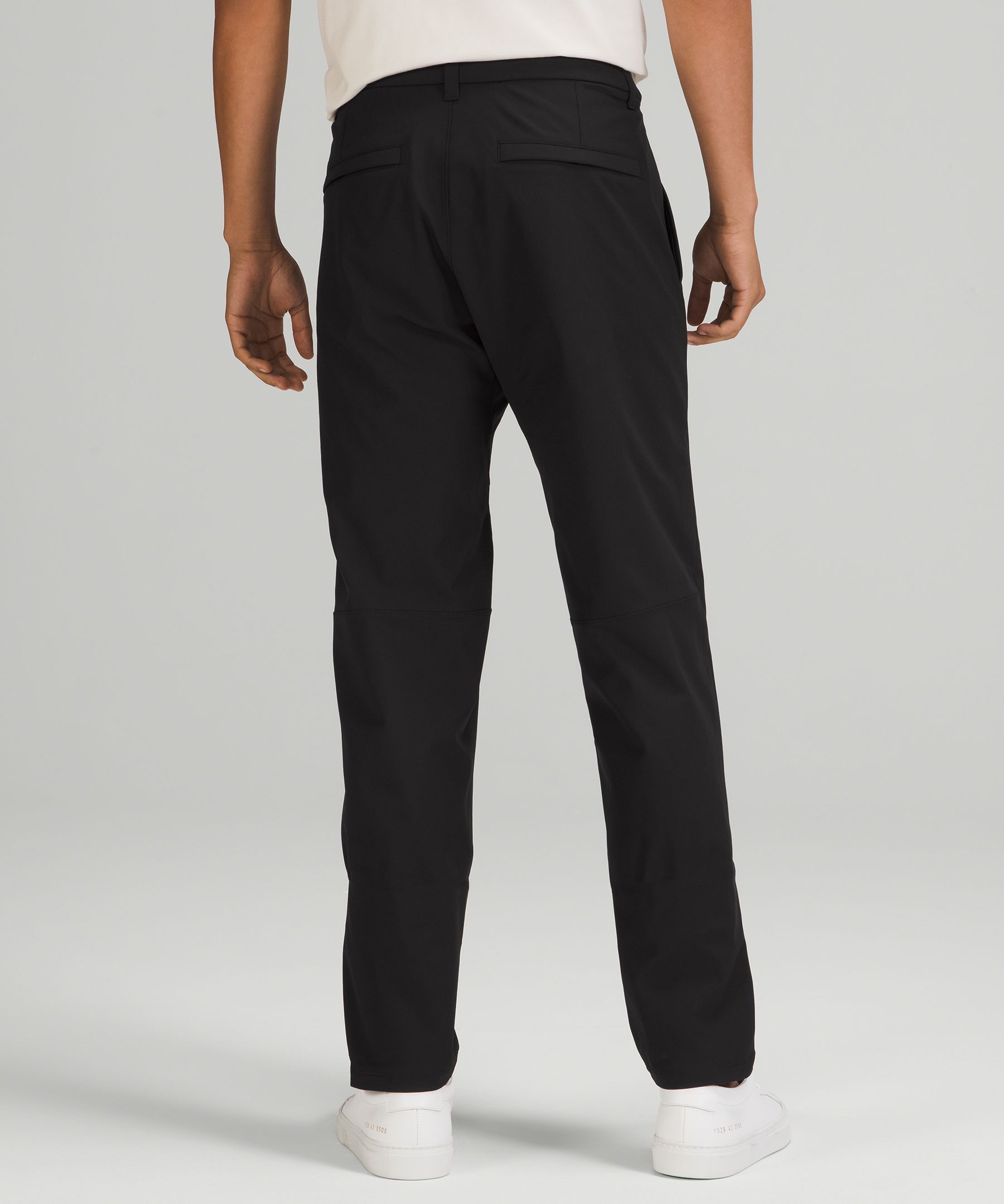 Shop Lululemon Commission Slim-fit Pants 34" Warpstreme In Black