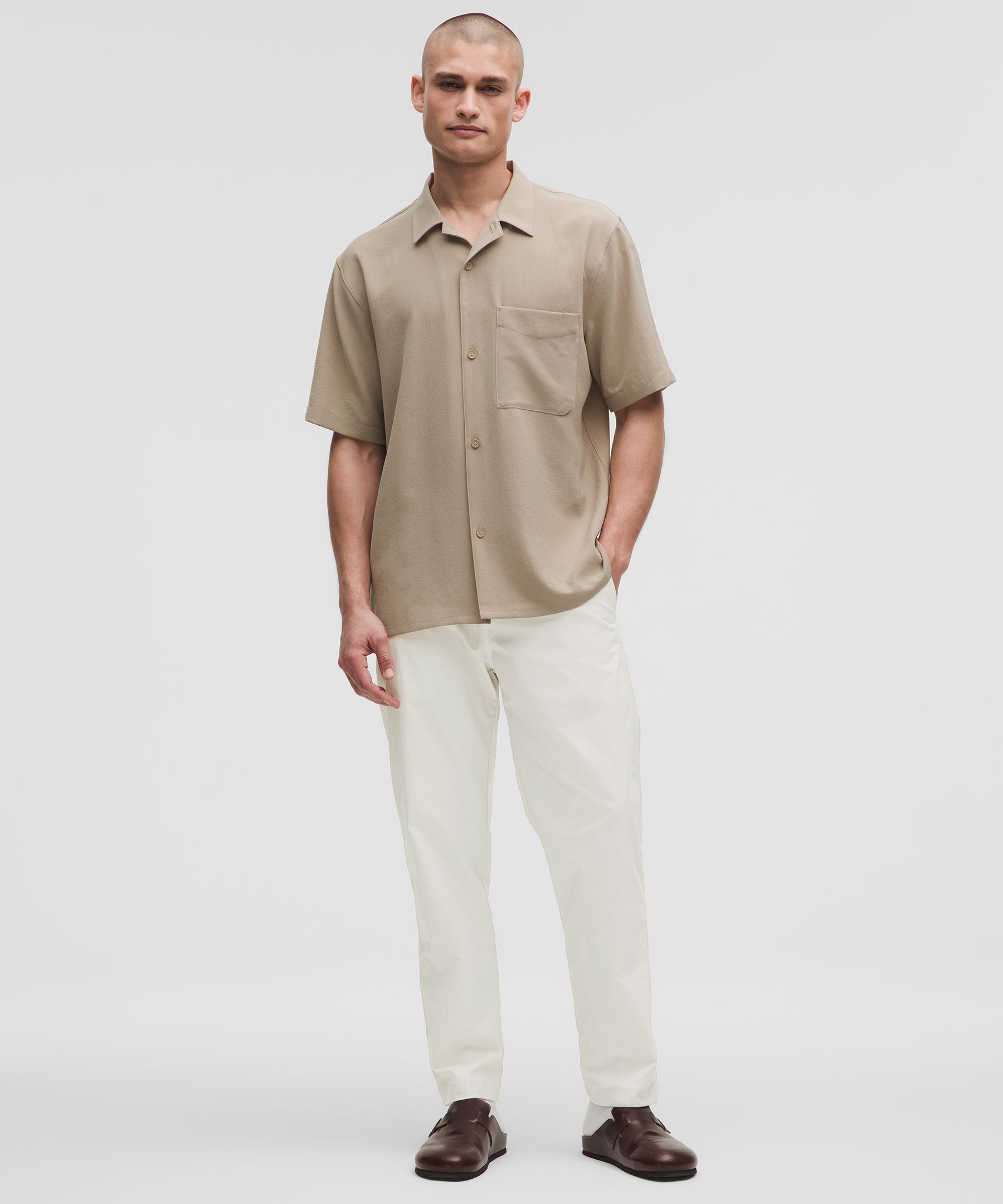 Shop Lululemon Relaxed-tapered Smooth Twill Trousers