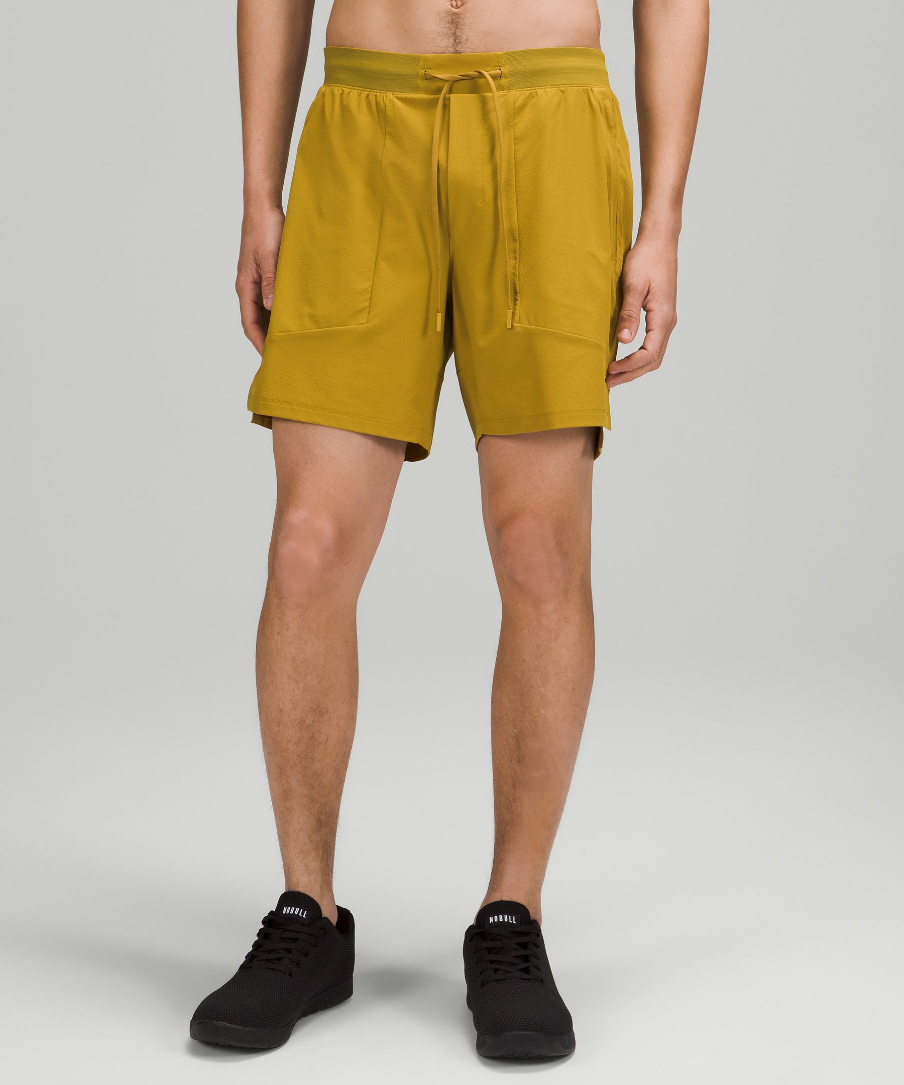 Lululemon License To Train Lined Shorts 7" In Auric Gold