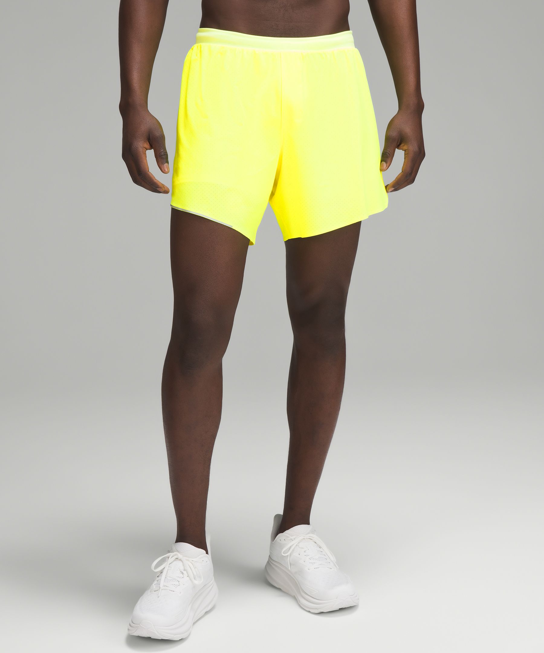 Yellow And Black Men's Running Shorts at best price in Tiruvallur