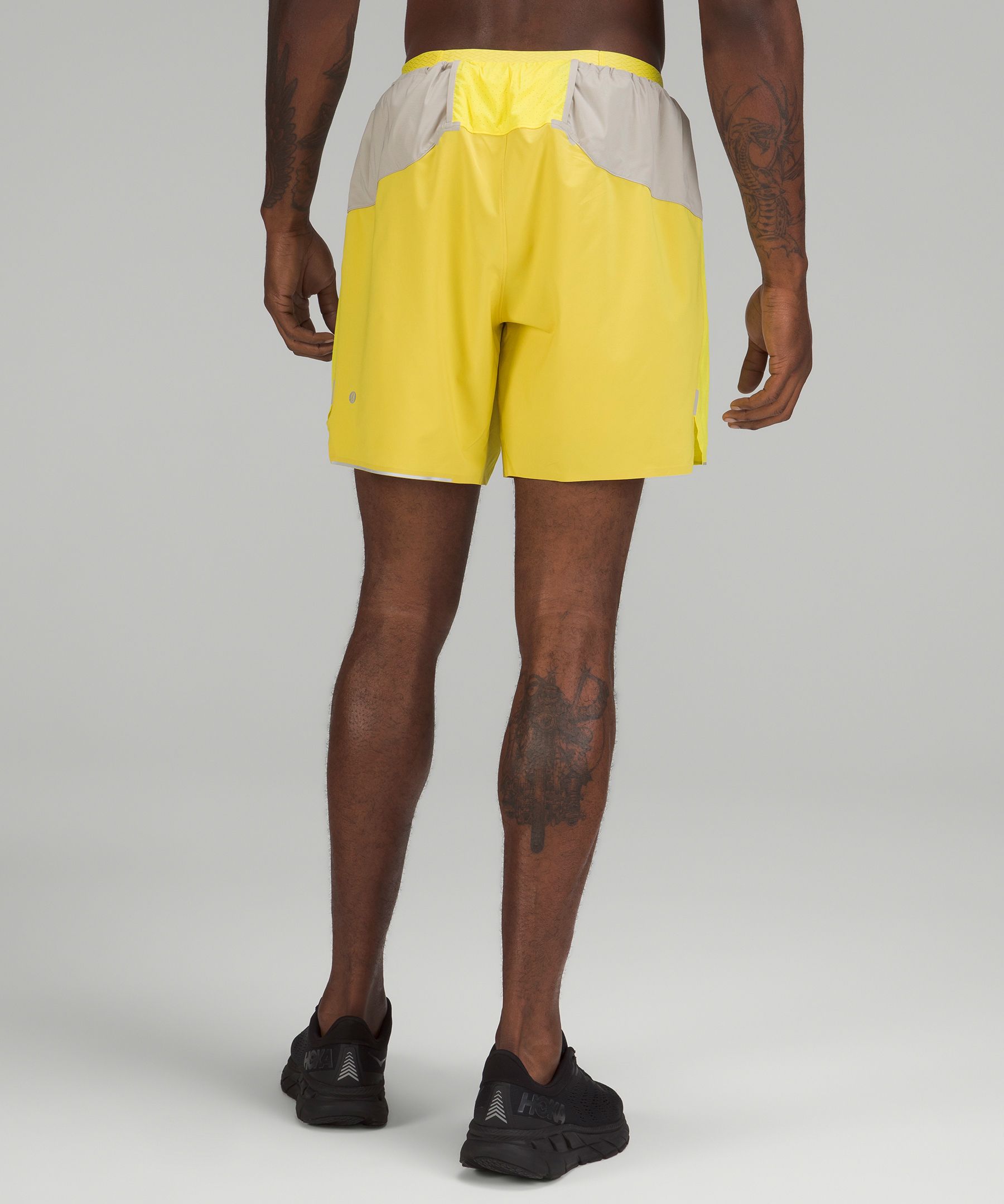 Yellow And Black Men's Running Shorts at best price in Tiruvallur