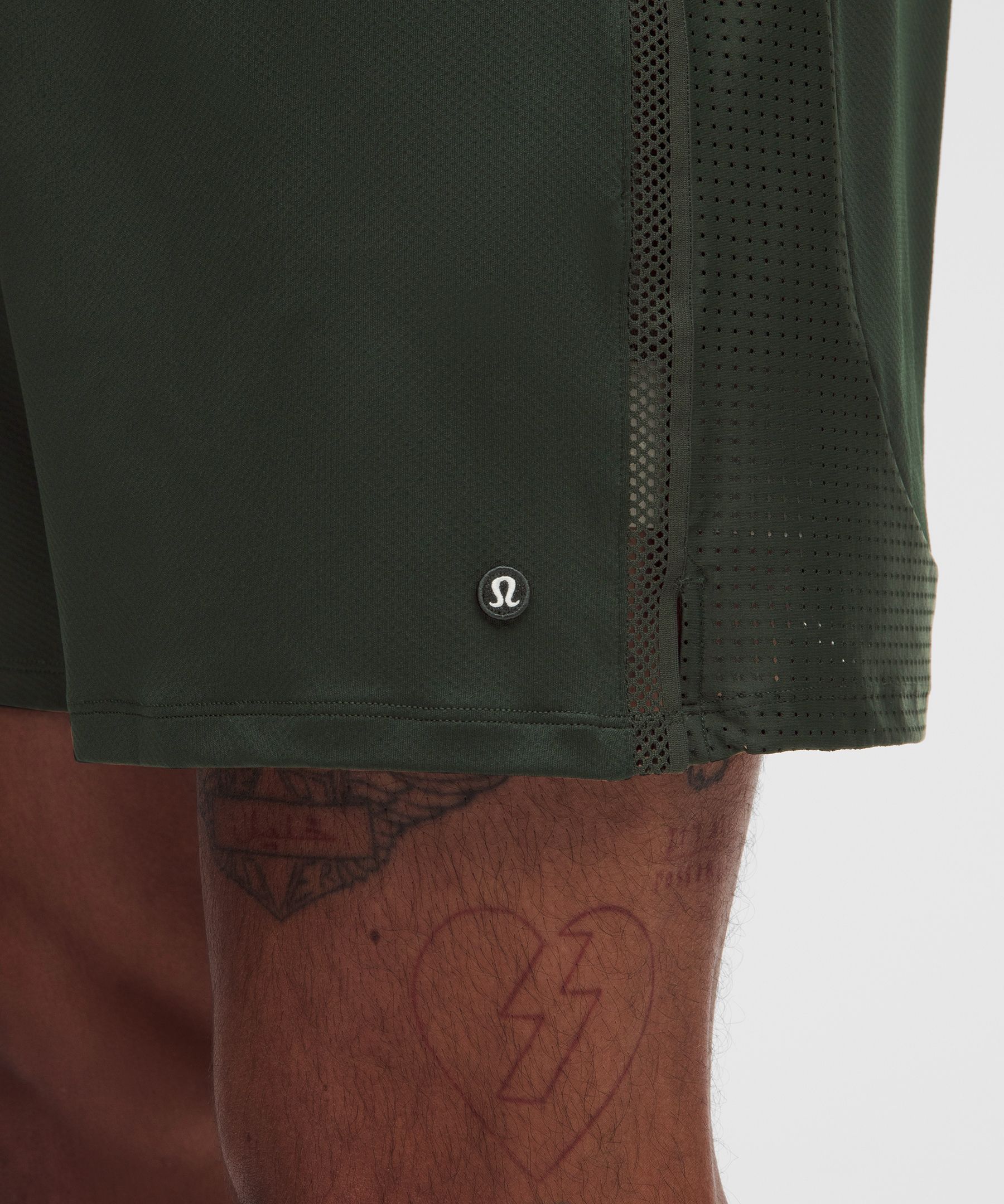 Short de tennis &agrave; empi&egrave;cements en maille 18 cm