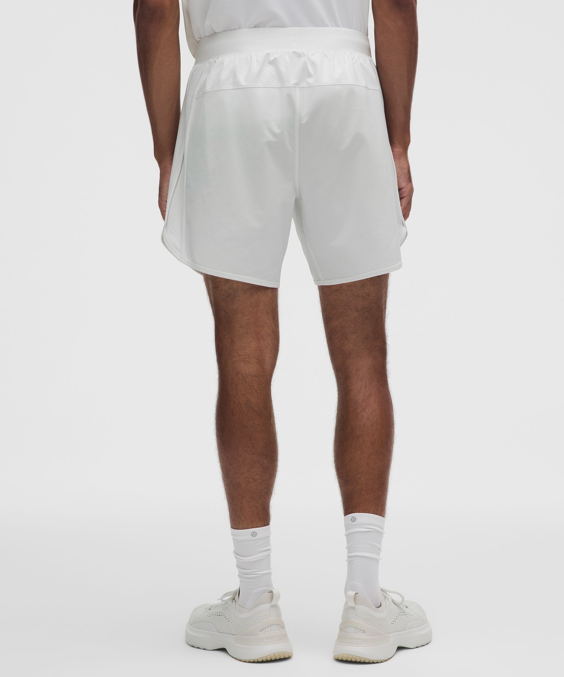 Pantal&oacute;n corto con paneles de malla para tenis, 18&nbsp;cm