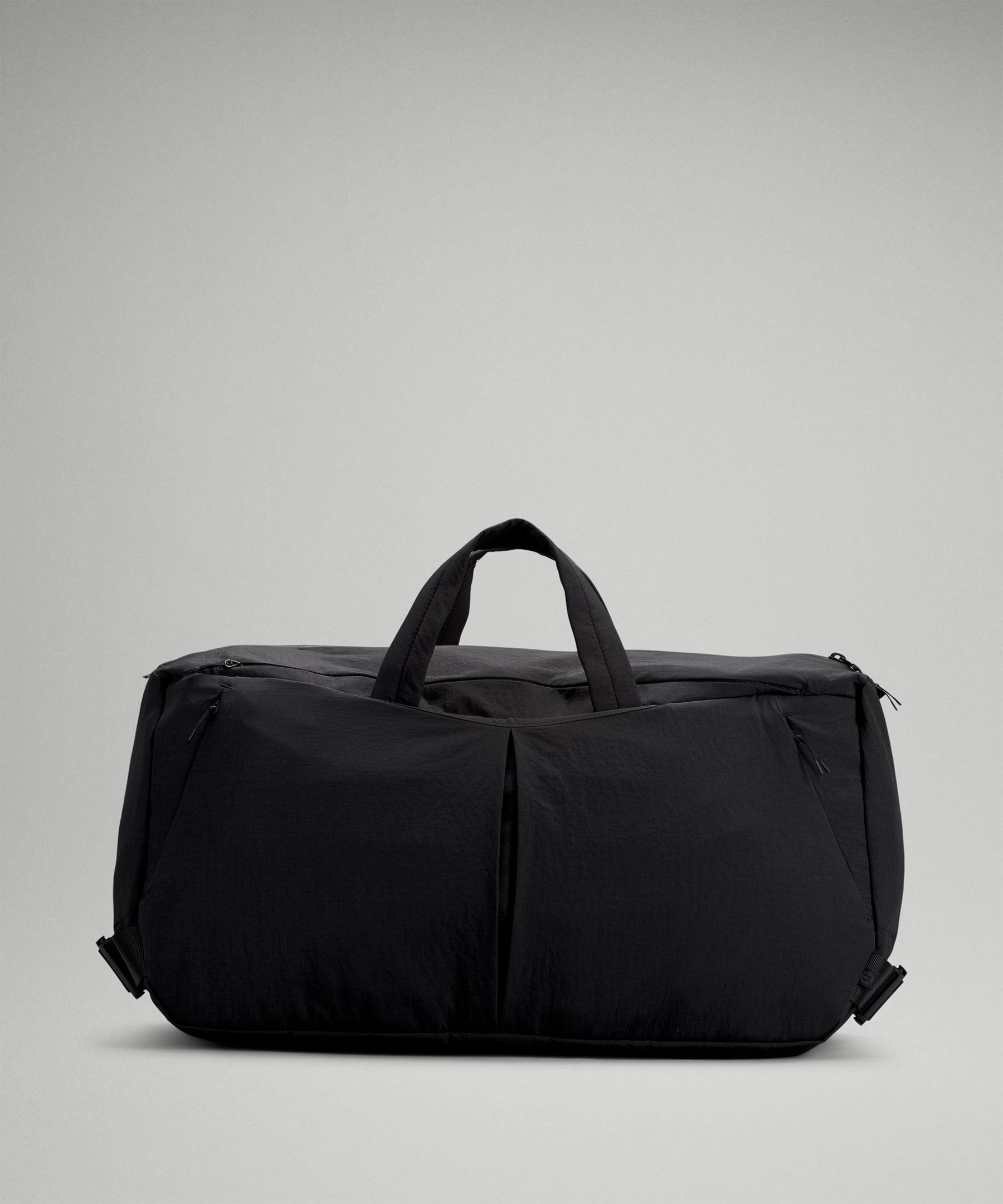 lululemon - Ready, set, weekend. This roomy duffle has compartments for  everything you need (including a laptop). The added bonus—with convertible  straps, you can switch things up and carry it as a