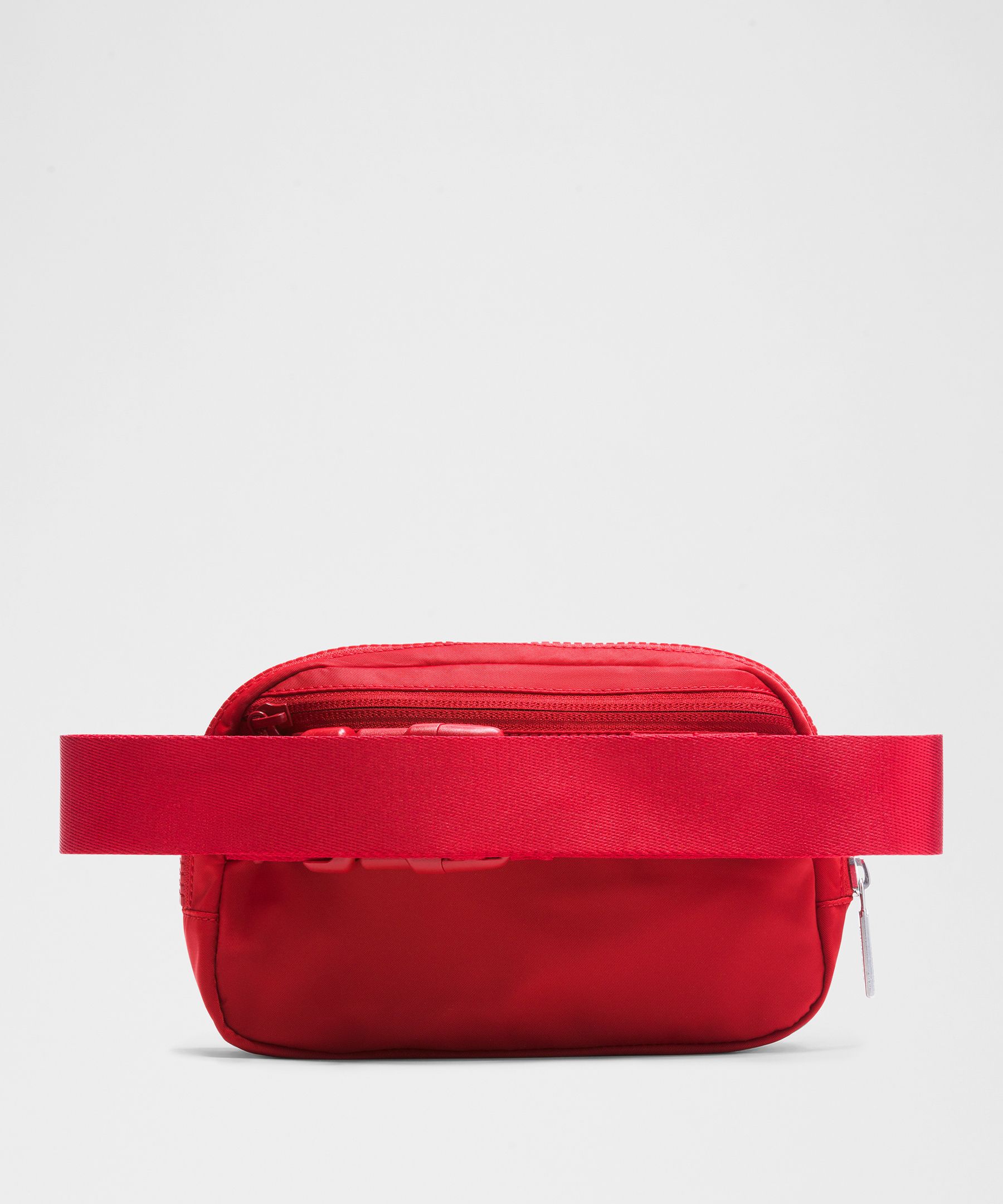 lululemon everywhere belt bag 1l red merlot Crossbody Interior pockets hold the essentials Lululemon Everywhere Belt Bag -