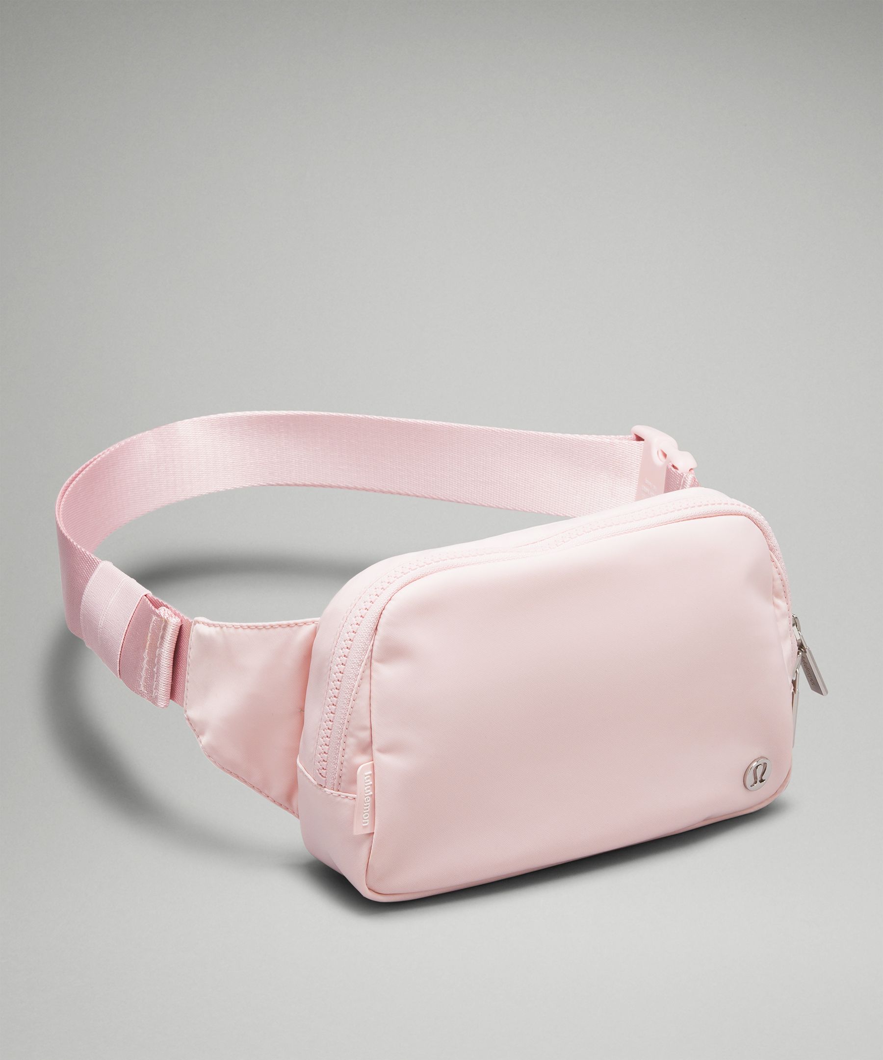 Lululemon Everywhere Belt popular Bag Pink Pastel NWT Silver Logo Silver Hardware