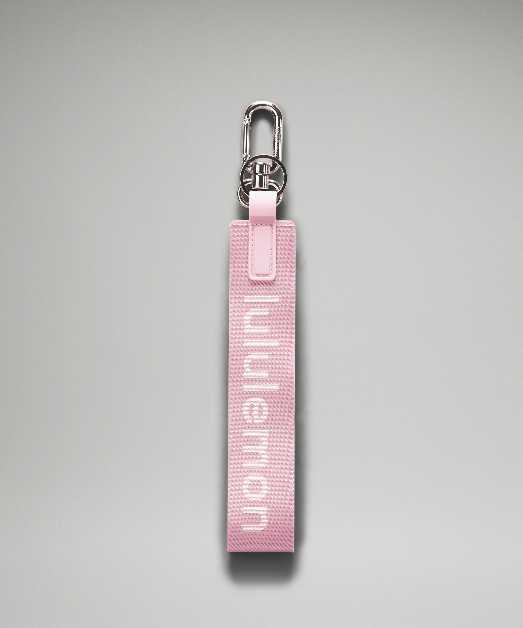 Lululemon's new Neverlost keychain in Love red/Sonic pink. This thing