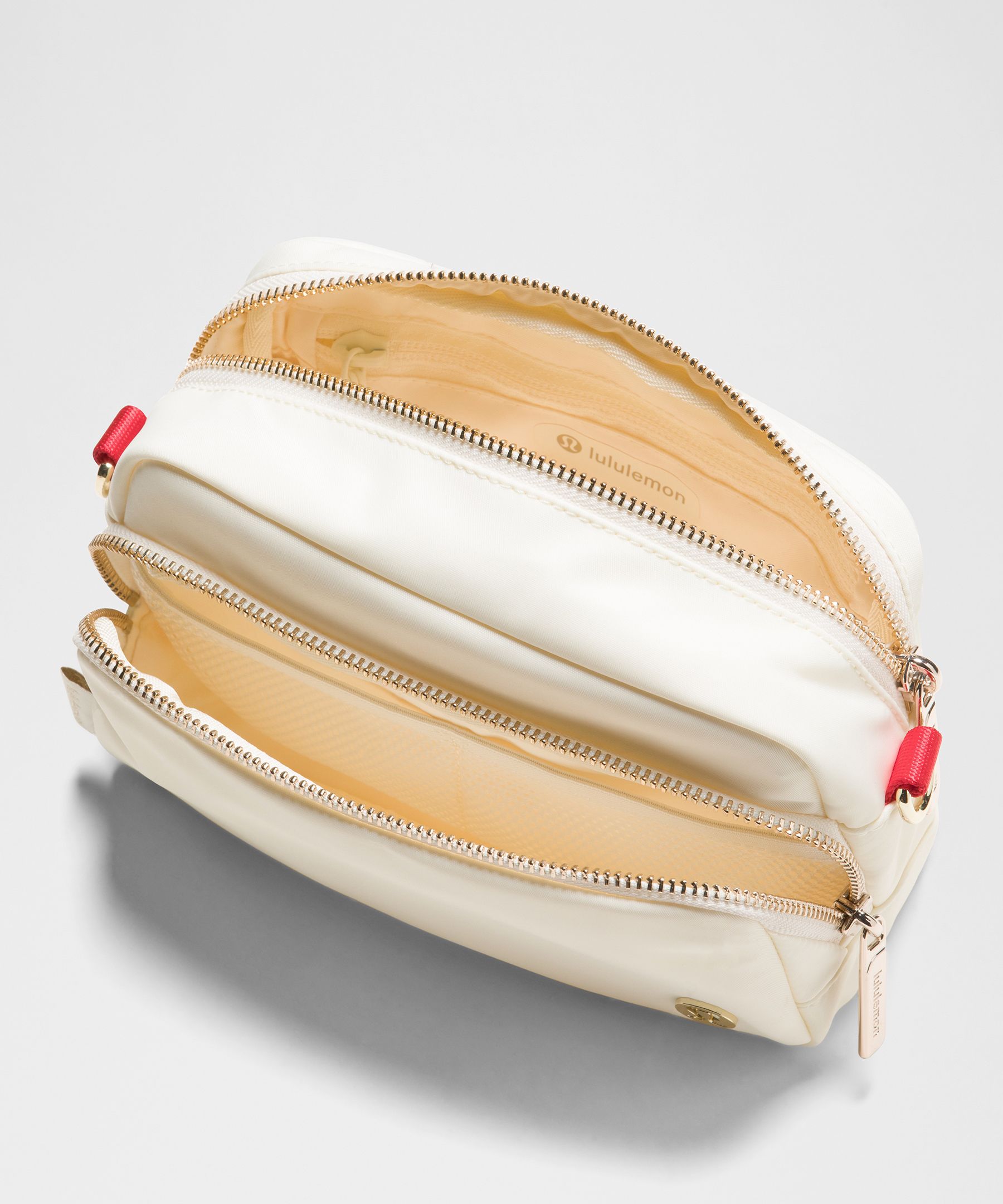 Everywhere Crossbody Bag 2L *Striped Wordmark