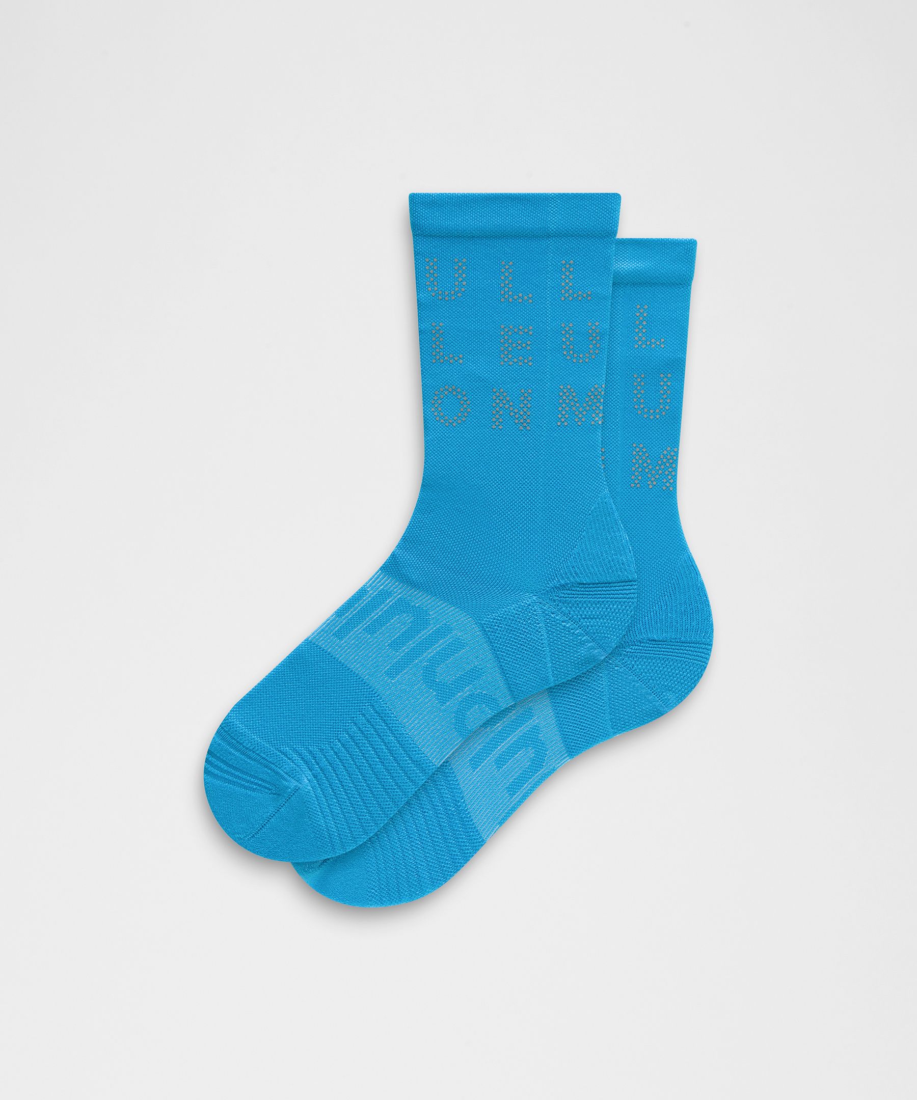 Calcetines unisex Power Stride tipo crew *Con detalles reflejantes