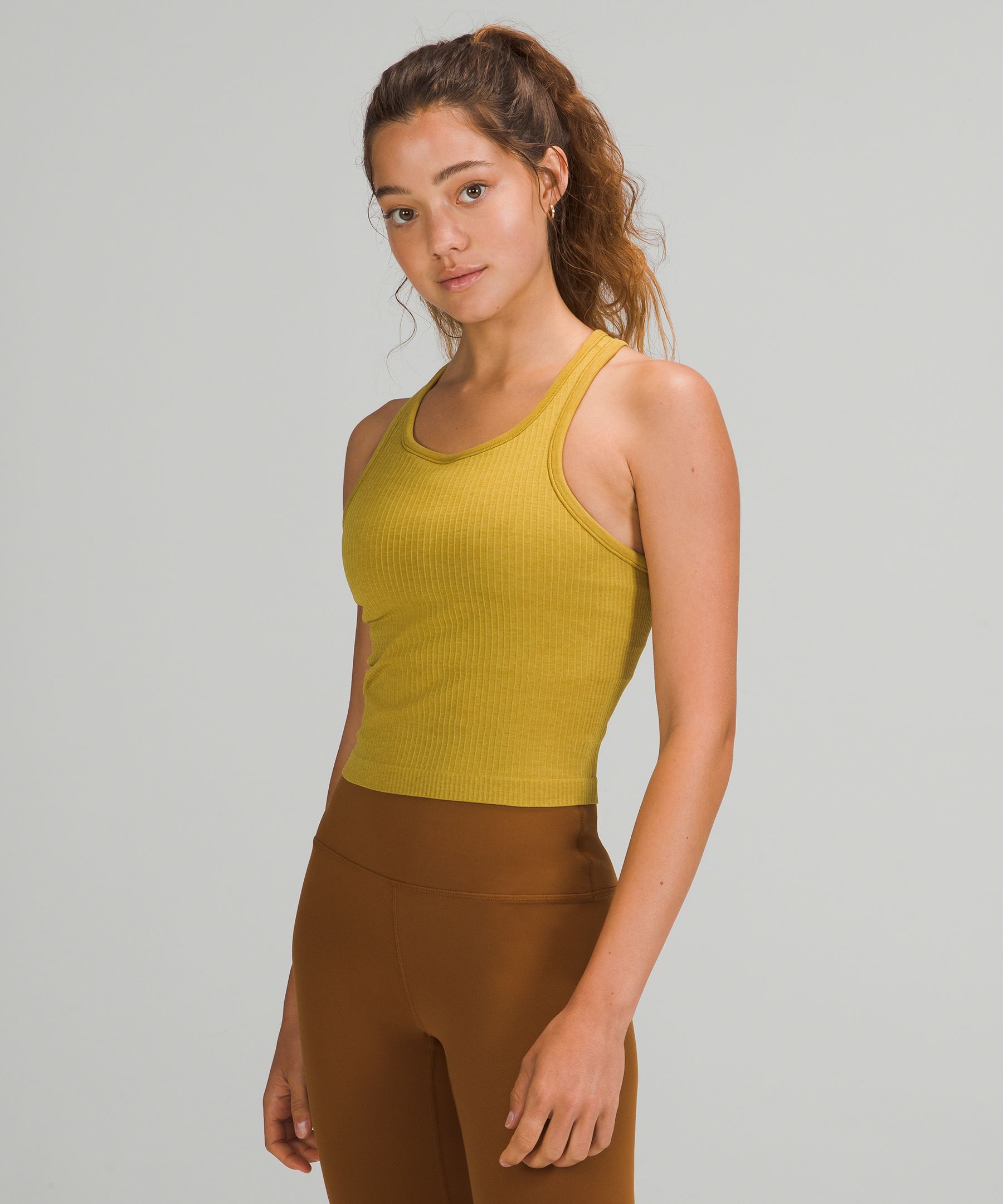 Lululemon Ebb To Street Cropped Racerback Tank Top In Auric Gold