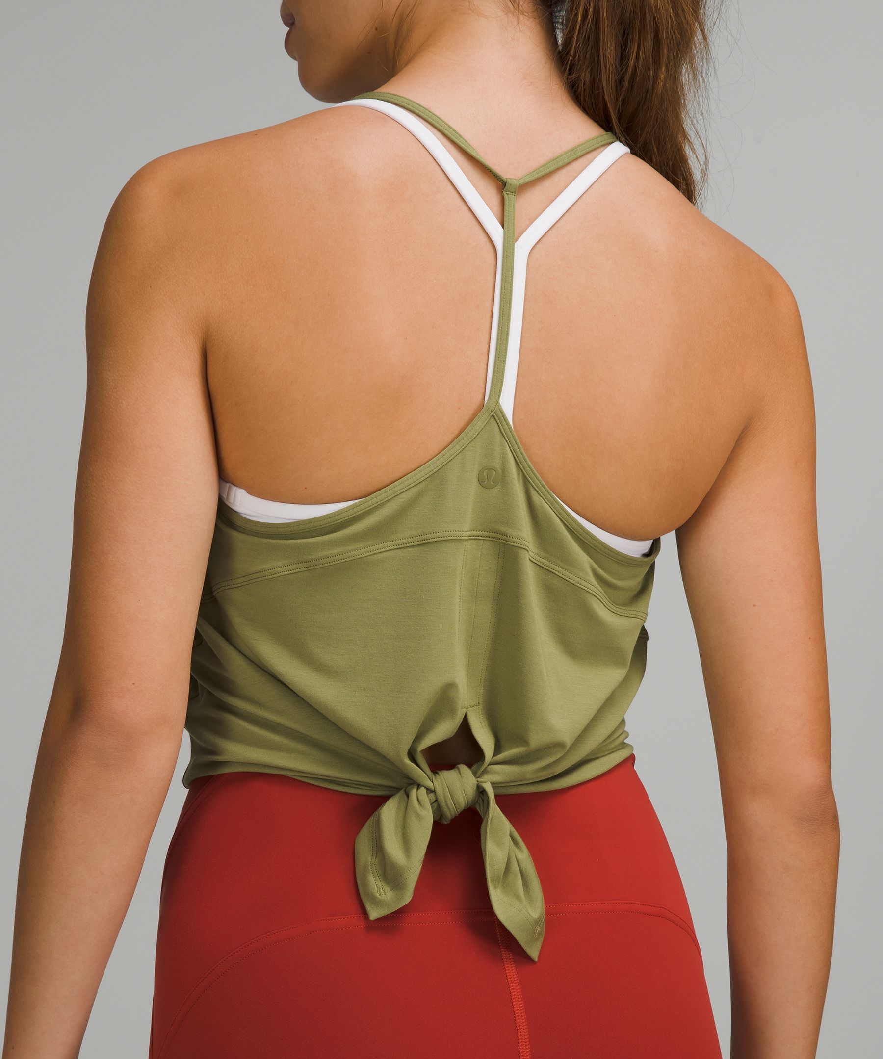 Modal silk yoga tank is fantastic! I just got mine today and I love it. TTS  and it drapes beautifully. Definitely a thinner material, but I'm a sucker  for anything modal. 
