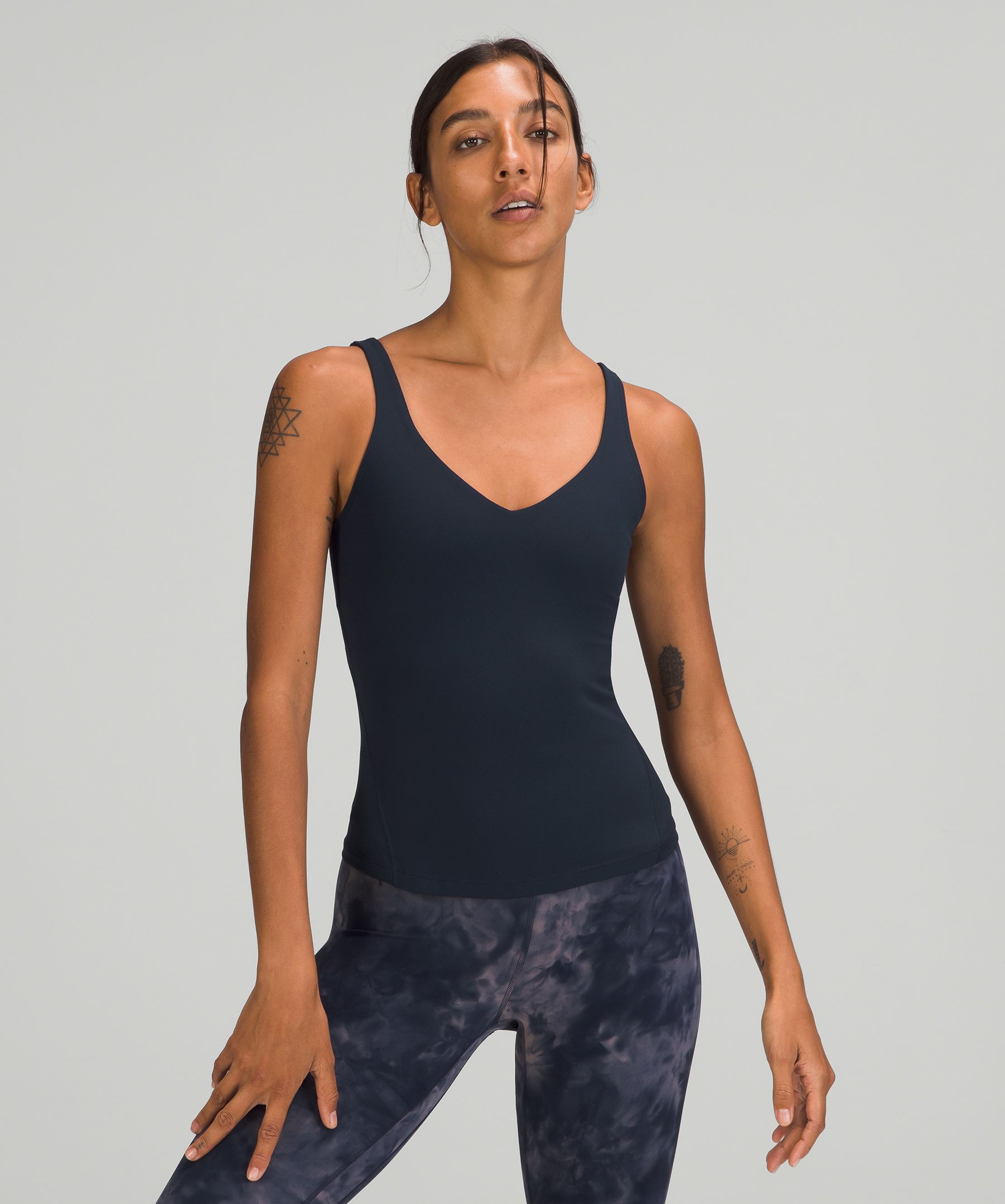 Lululemon align tanks! I fel like the sizing with these tanks is a lit