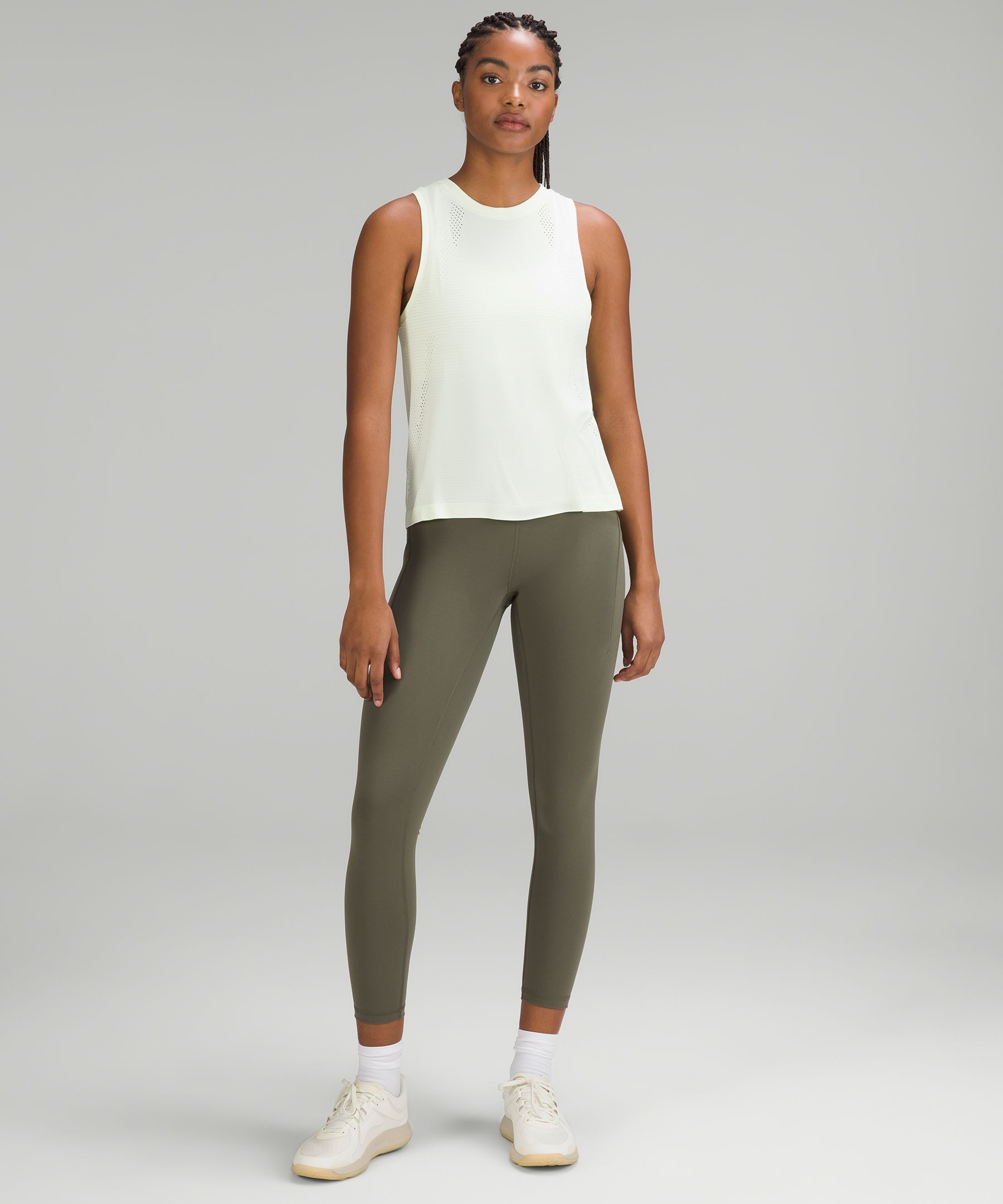 Lululemon Train to Be Tank Top in Lip Gloss worn by Stephanie