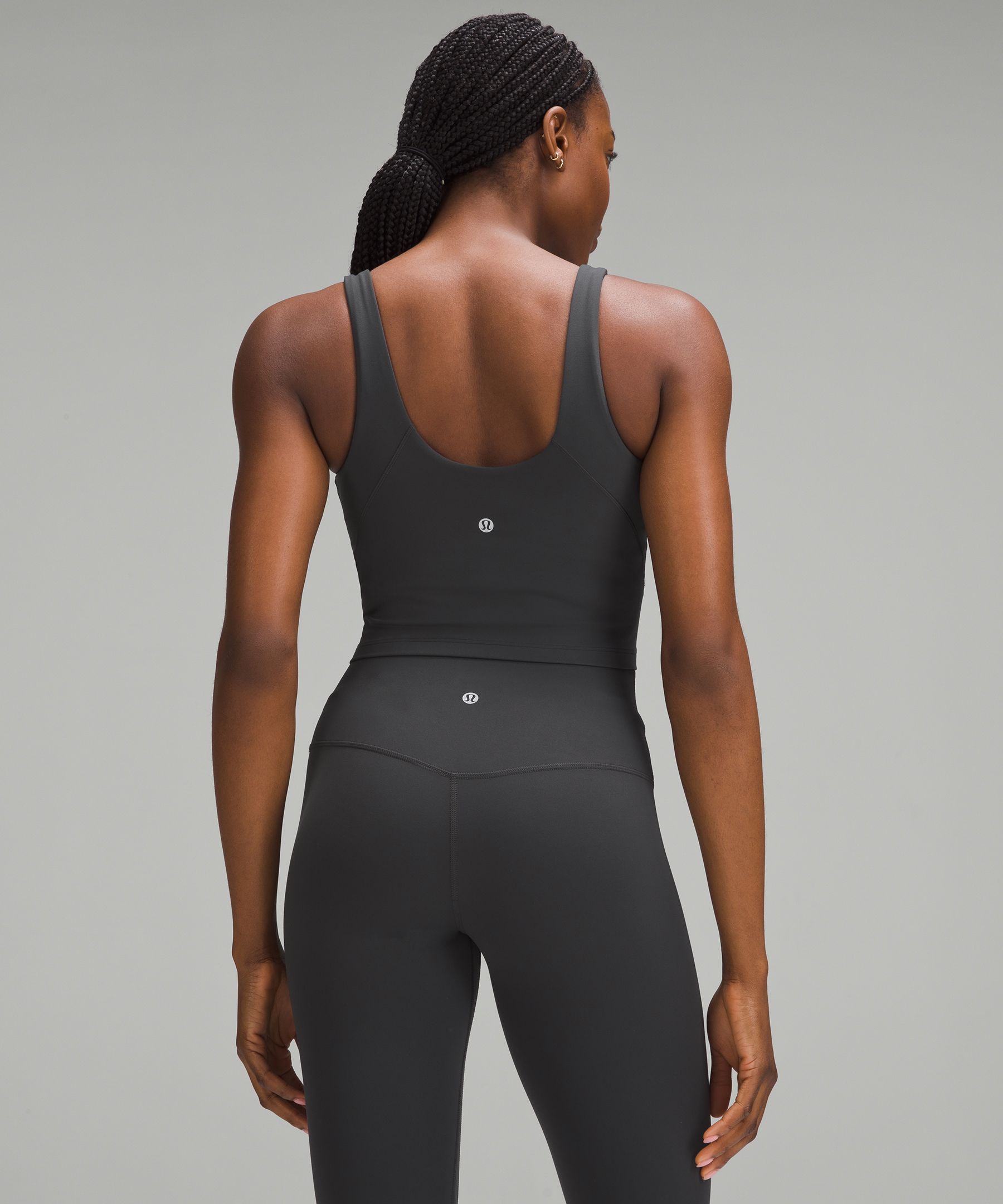 Rhino gray is life wearing a size 2 paired with ancient copper align tank  size 4. I'm not totally sold on the tank though. It looks cute but omg it's  sooo tight. : r/lululemon