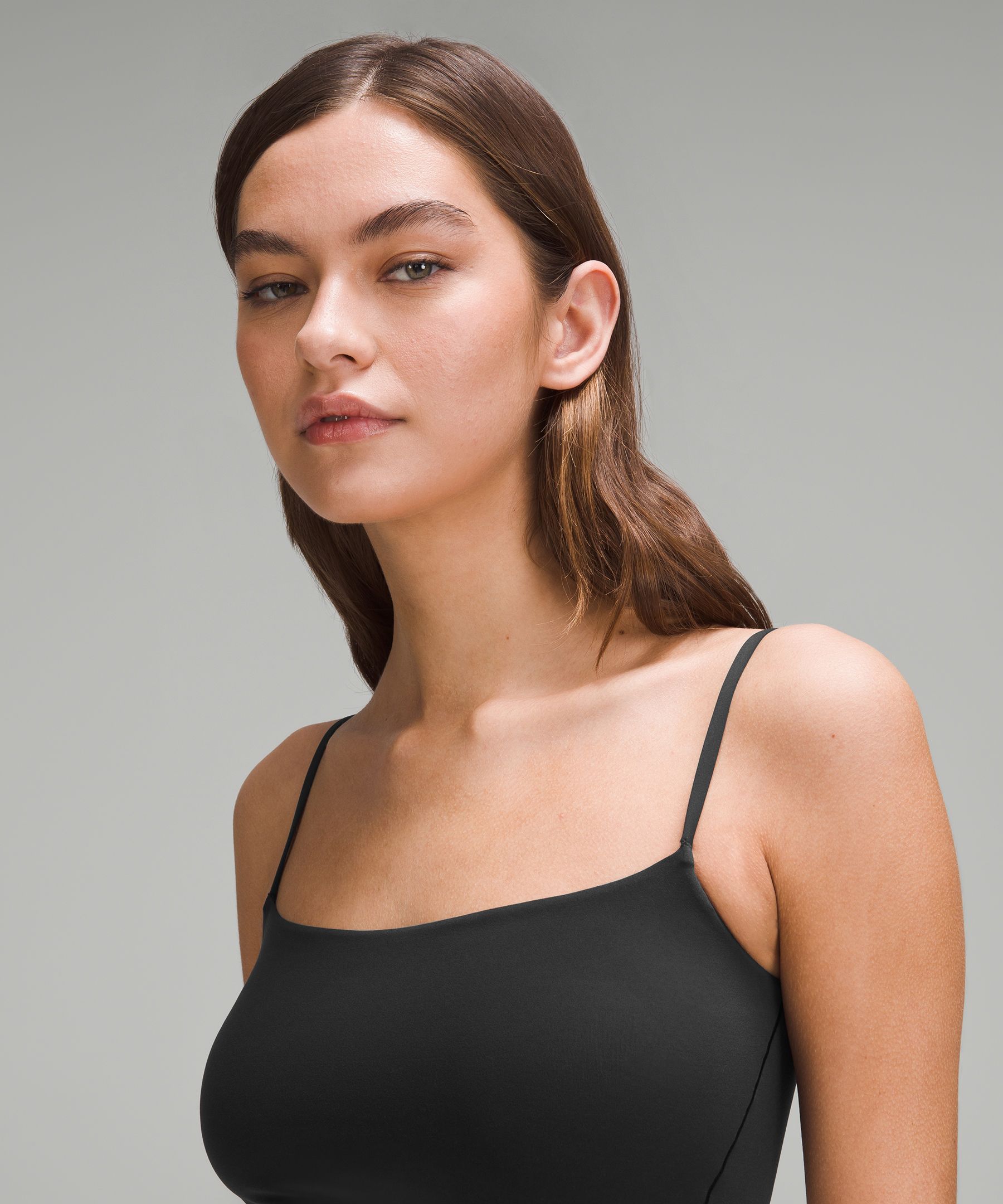 Women's Solid Seamless Camisole. • Spaghetti straps • Seamless design for  extra comfort • Longline hem • Soft and stretchy • Curve-Hugging • Body  Contouring • Perfect for layering under sheer tops