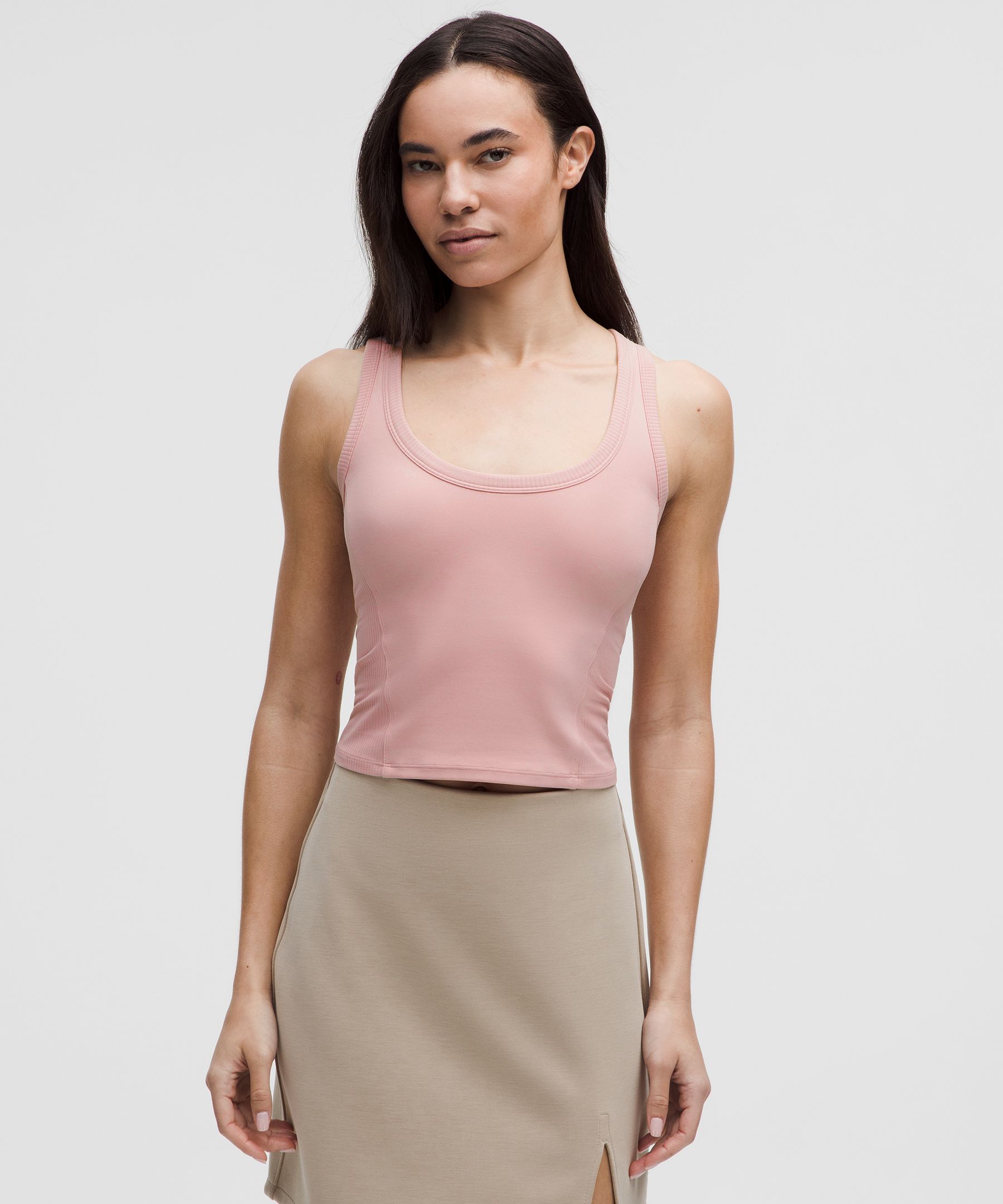 Soft support. This scoop-neck tank is made from our buttery-soft Nulu™ fabric with a shelf-bra liner