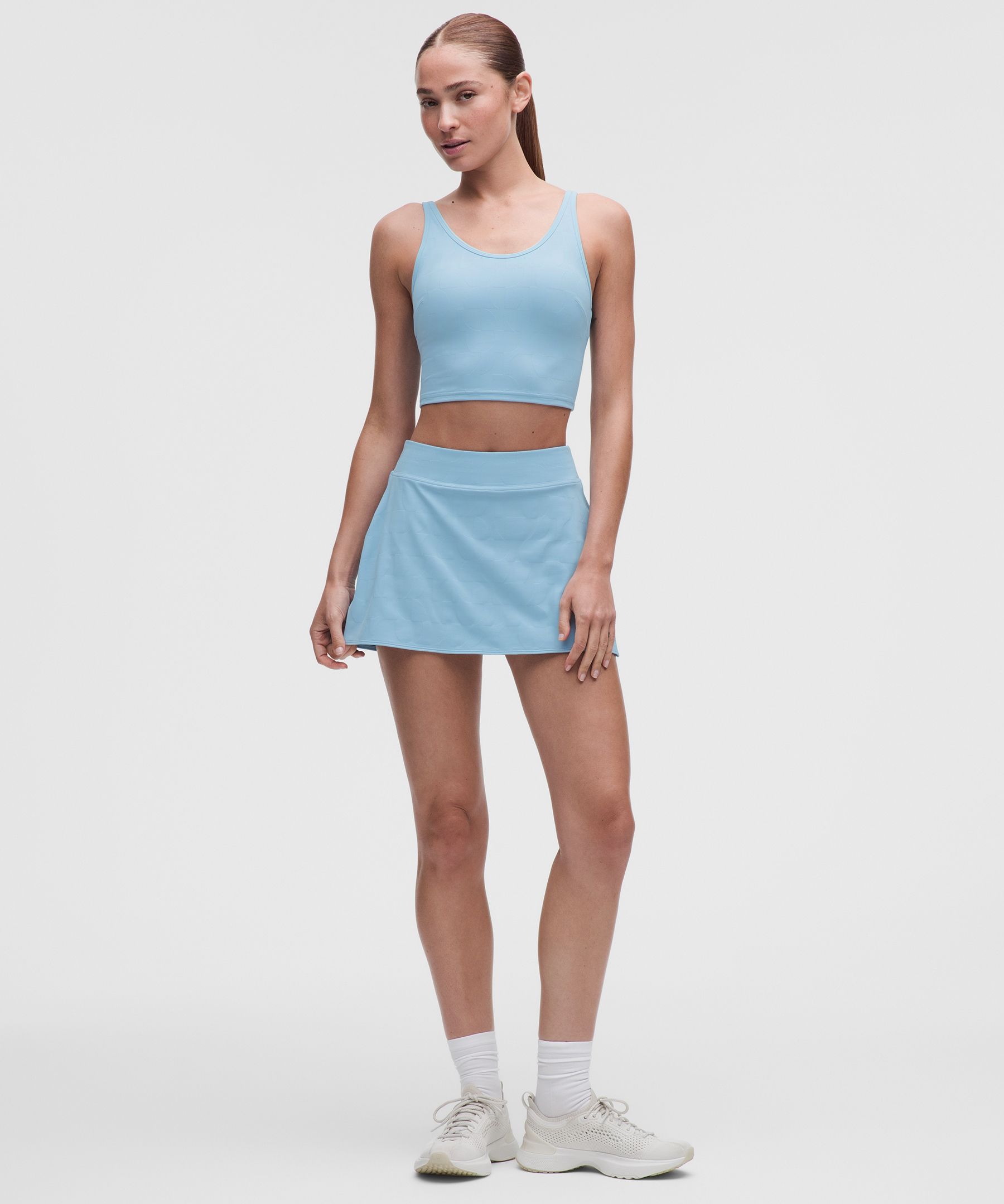 Top de tirantes de sujeci&oacute;n media con abertura y cuello redondo para tenis, copas B/C *Jacquard