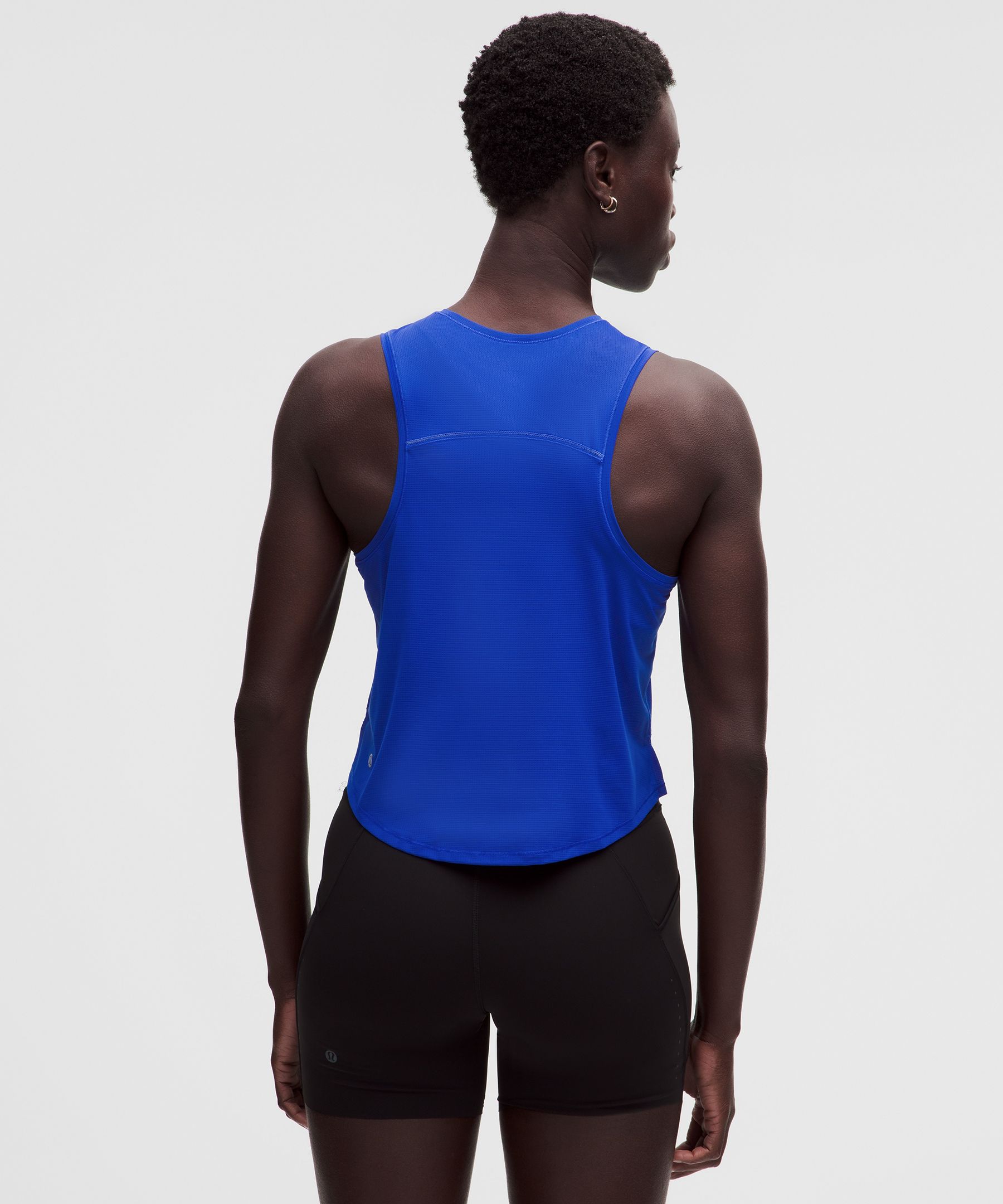 Camiseta ligera para correr con largo a la cintura