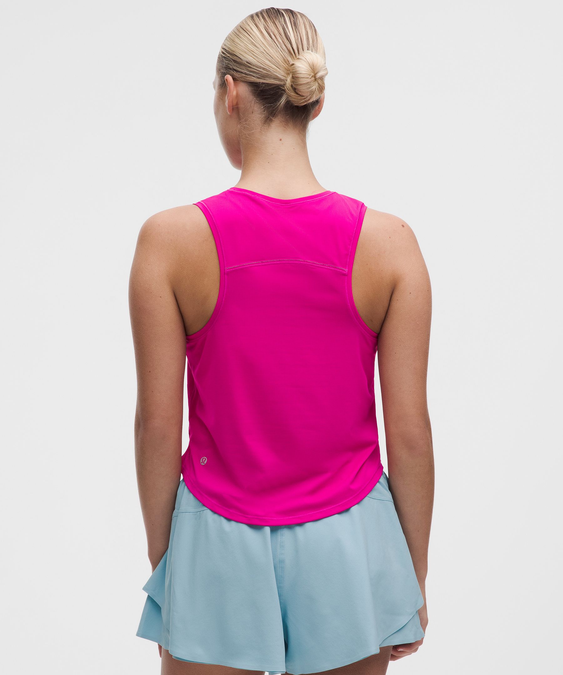 Camiseta ligera para correr con largo a la cintura