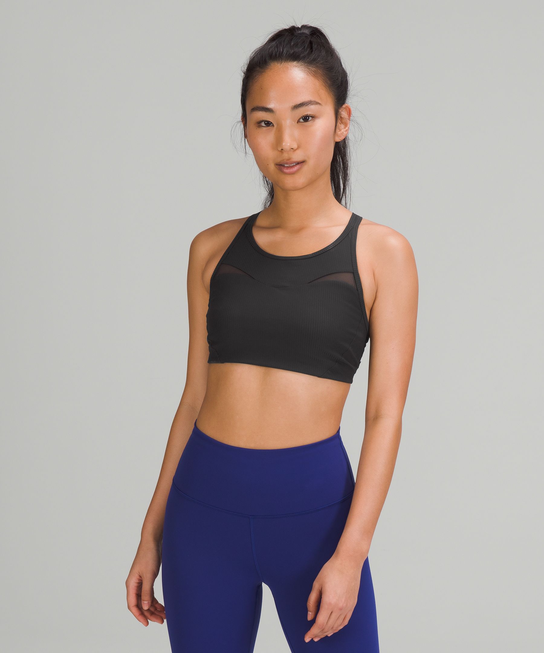 Black High Neck Medium Support Sports Bras.