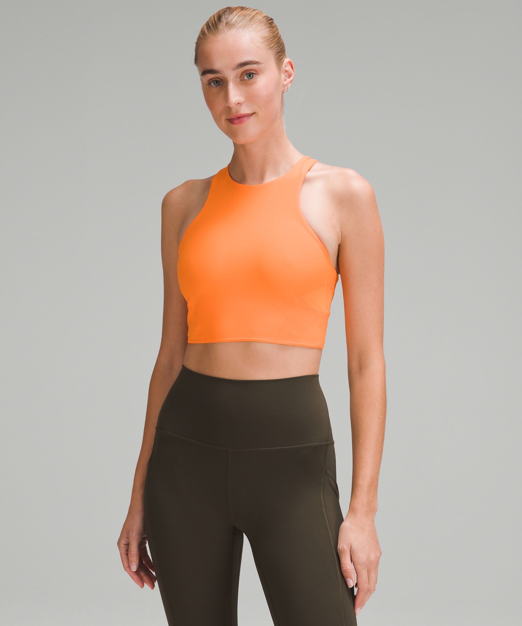 Lululemon,Soft Orange, Strappy-Back Sports bra, EUC, Size 4