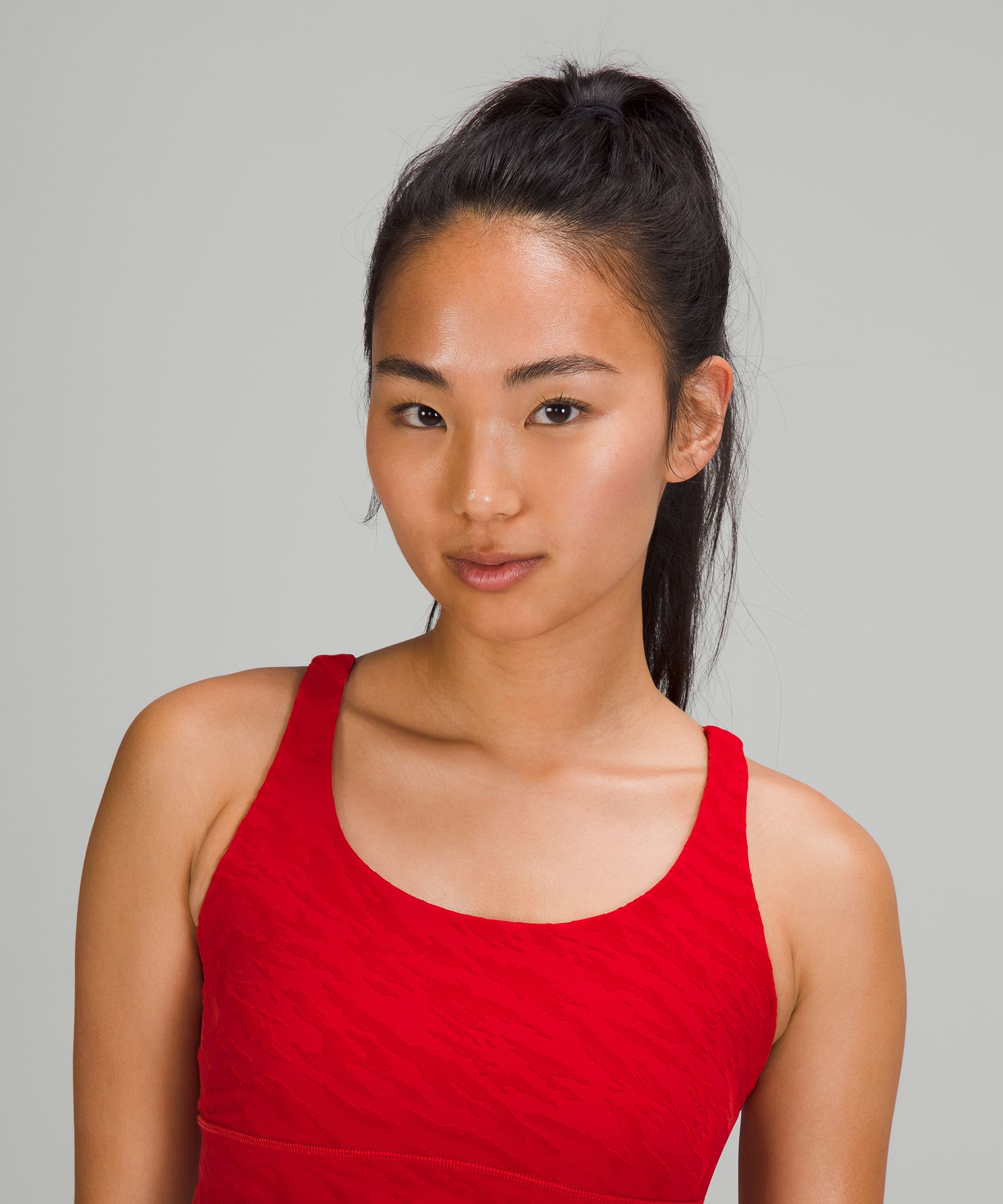 A Red Top: lululemon Lunar New Year Energy Longline Bra