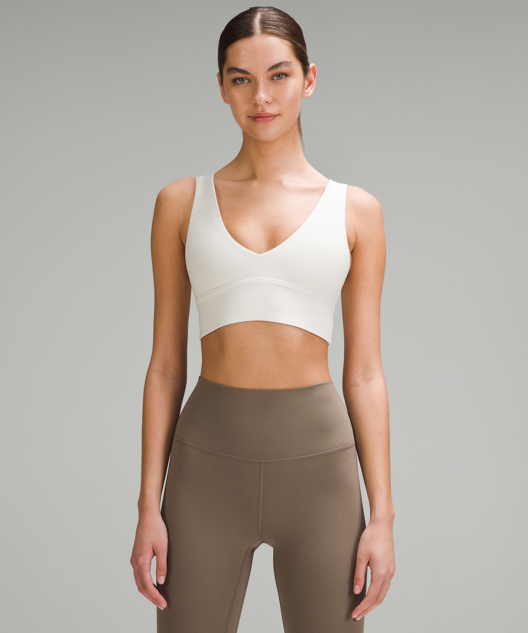 lululemon - Pair this long-line v-neck bra with a pair of high-rise bottoms  for hot yoga classes. Sheer details along the neckline and underband give  you extra airflow. Meet the Find Focus