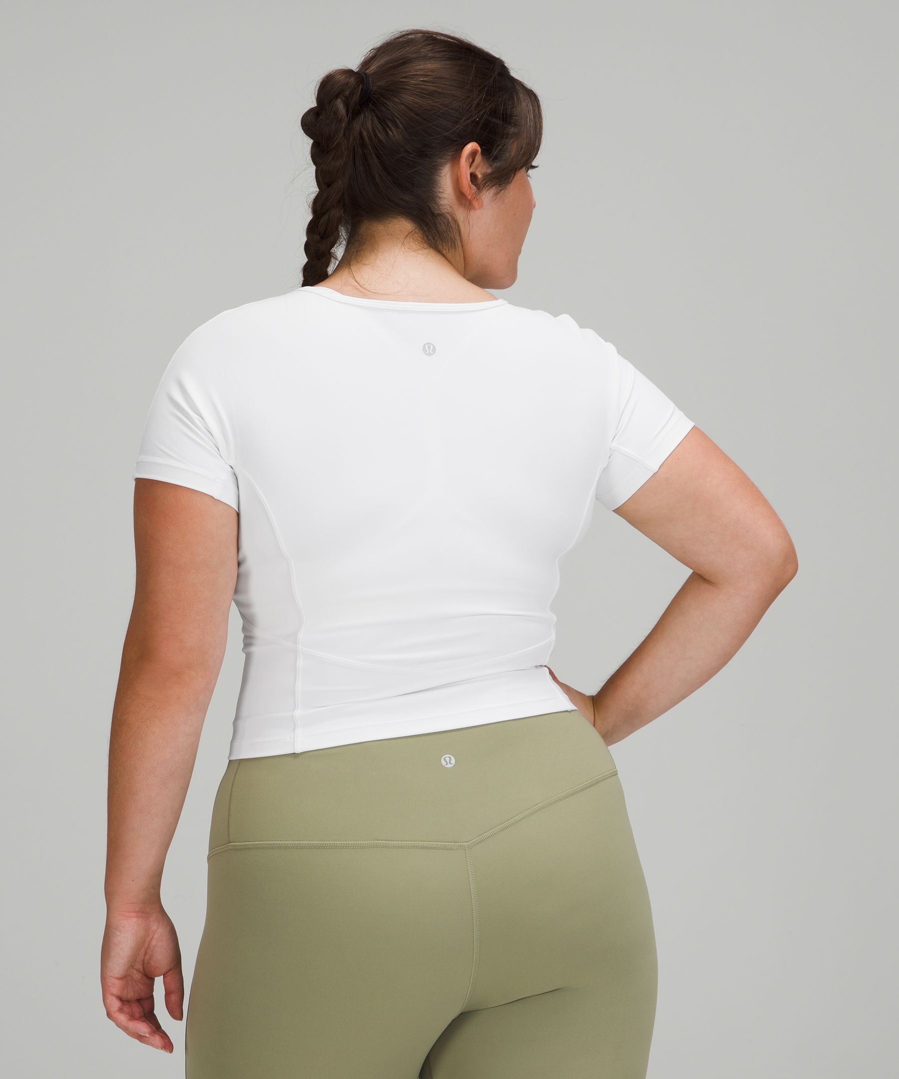 Lululemon Nulu Cropped Slim Yoga Short Sleeve Shirt - ShopStyle Activewear  Tops