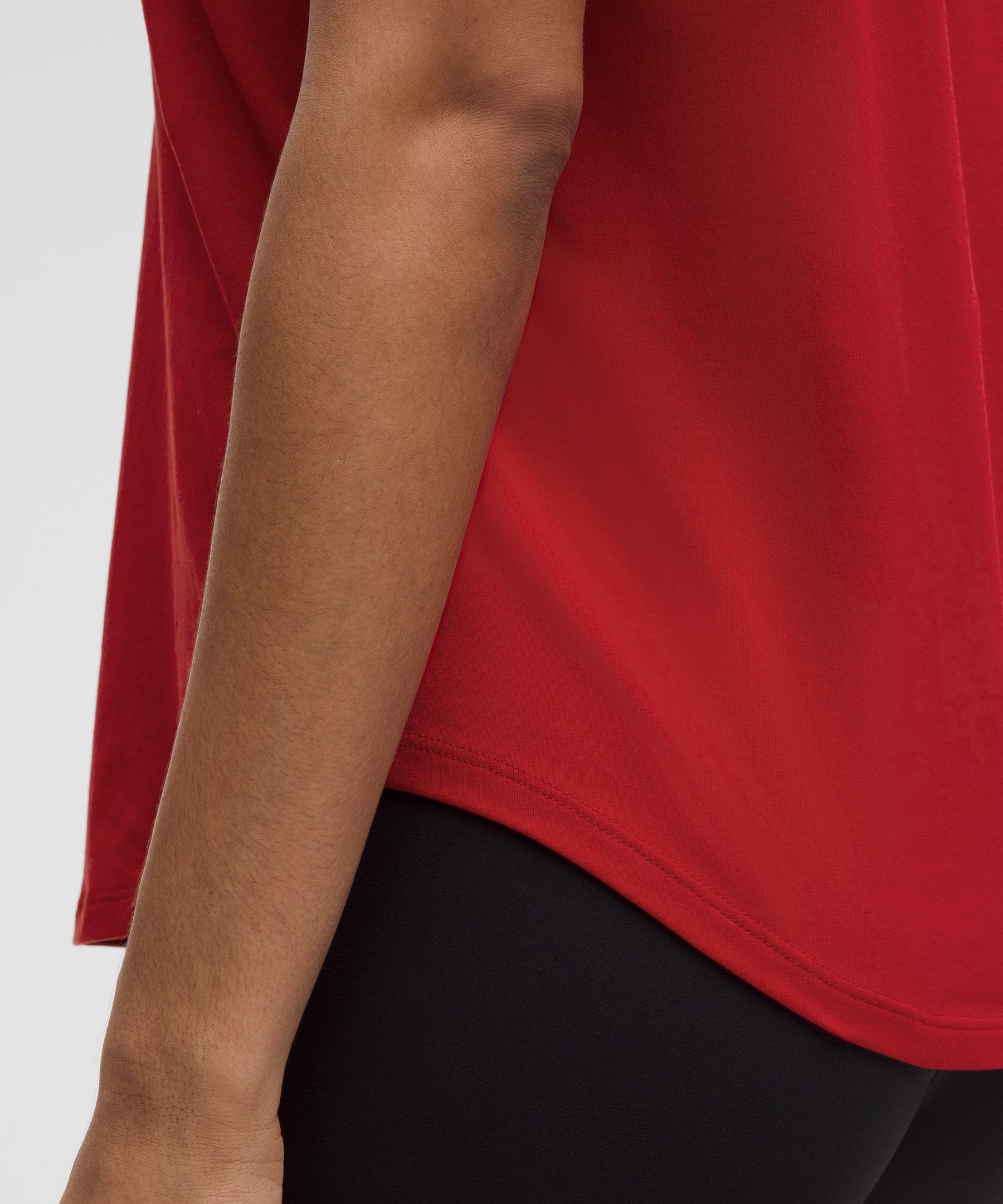 Love Curved-Hem Crewneck T-Shirt | Women's Short Sleeve Shirts & Tee's