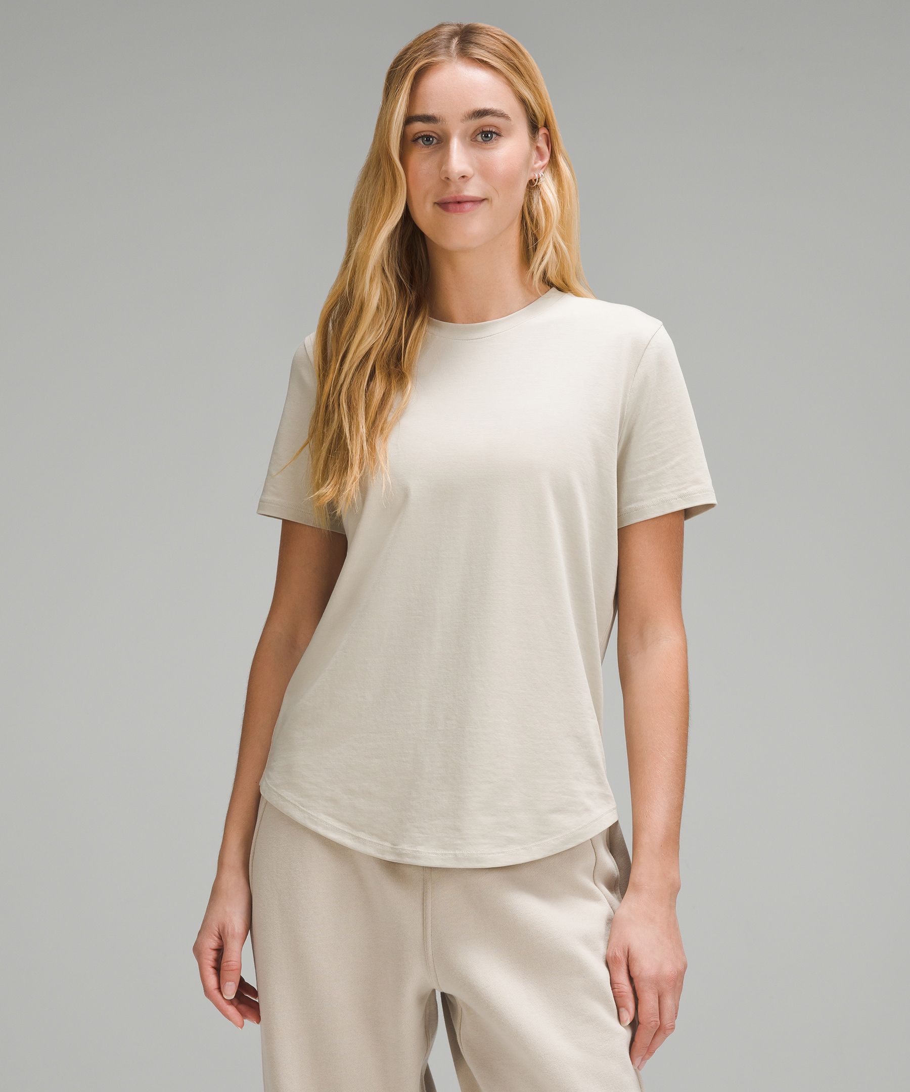 Love Curved-Hem Crewneck T-Shirt | Women's Short Sleeve Shirts & Tee's ...