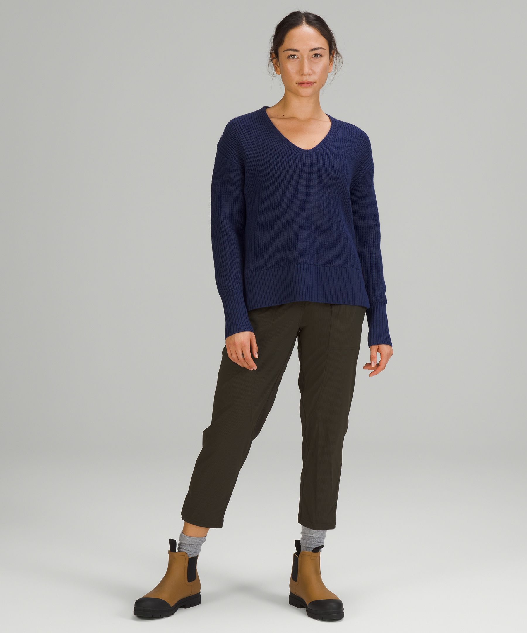 Try our Merino Wool Crew Neck Sweater paired with our signature