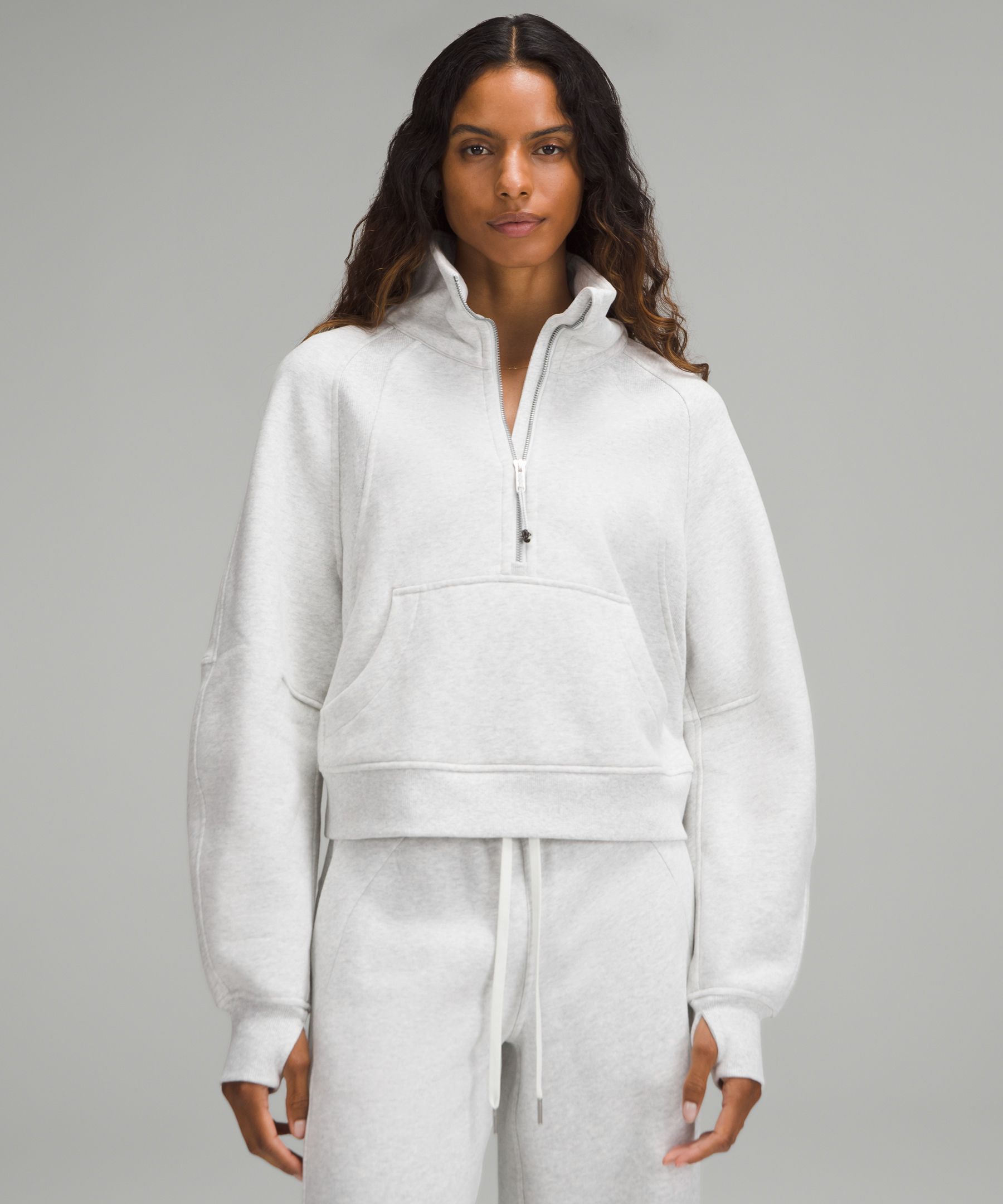 Thoughts on the Scuba half-zip in Bone? I bought the Scuba funnel-neck in  White Opal around a year ago, but the color seems darker/more yellow than  some other White Opal items I