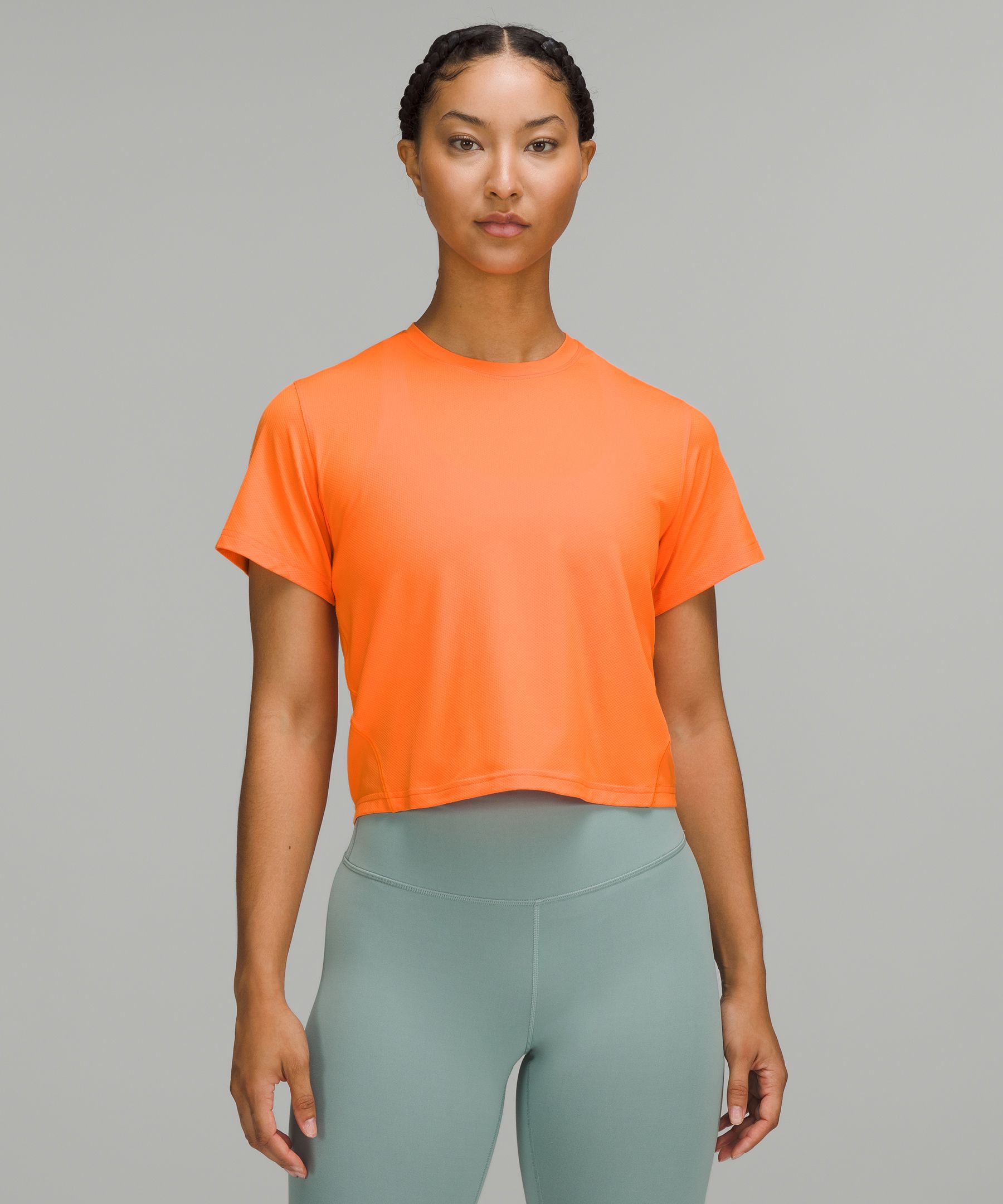 Lululemon Ventilated Open-back Training T-shirt In Orange Soda