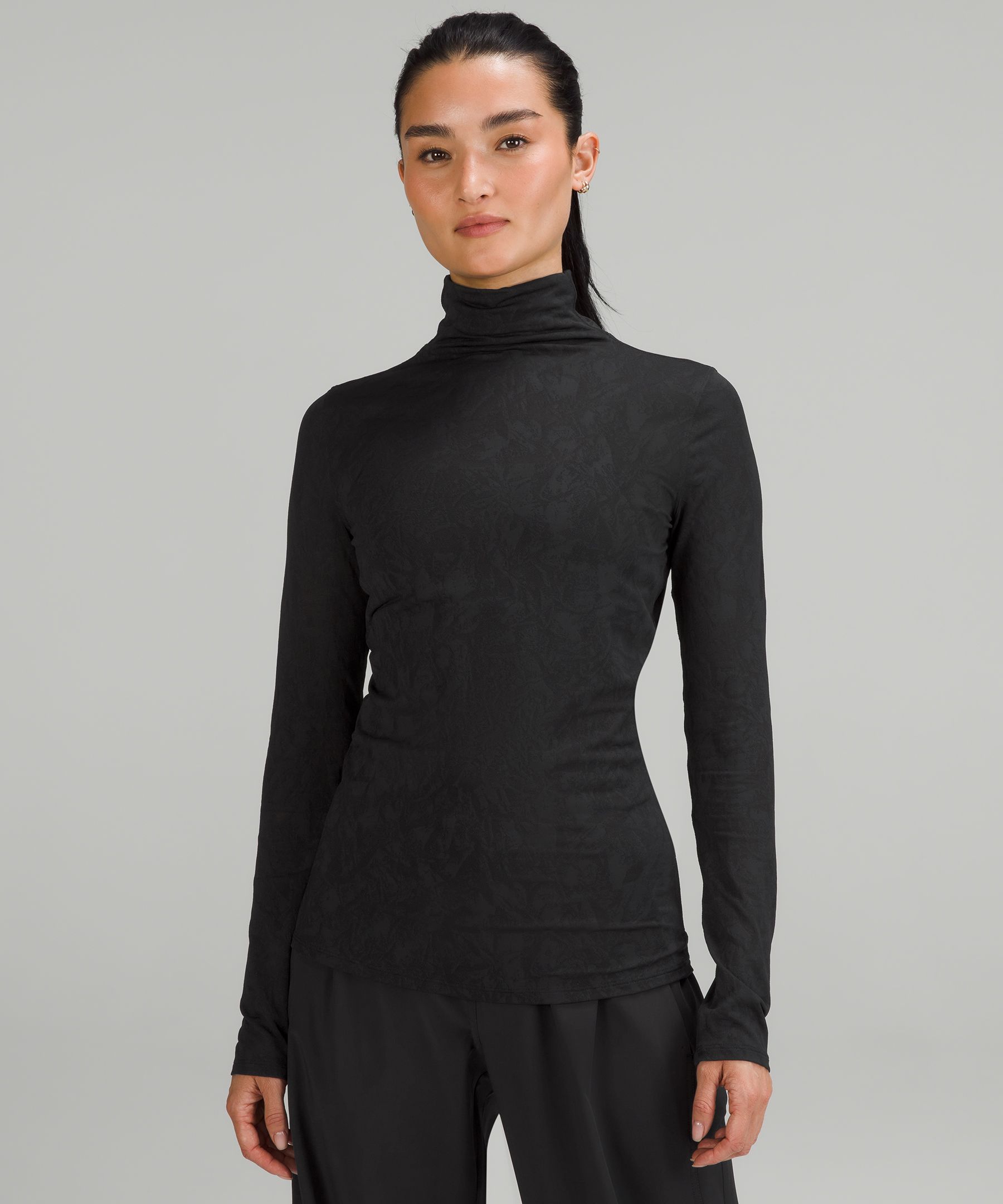 Which outfit should I go out in? First is a lululemon turtleneck