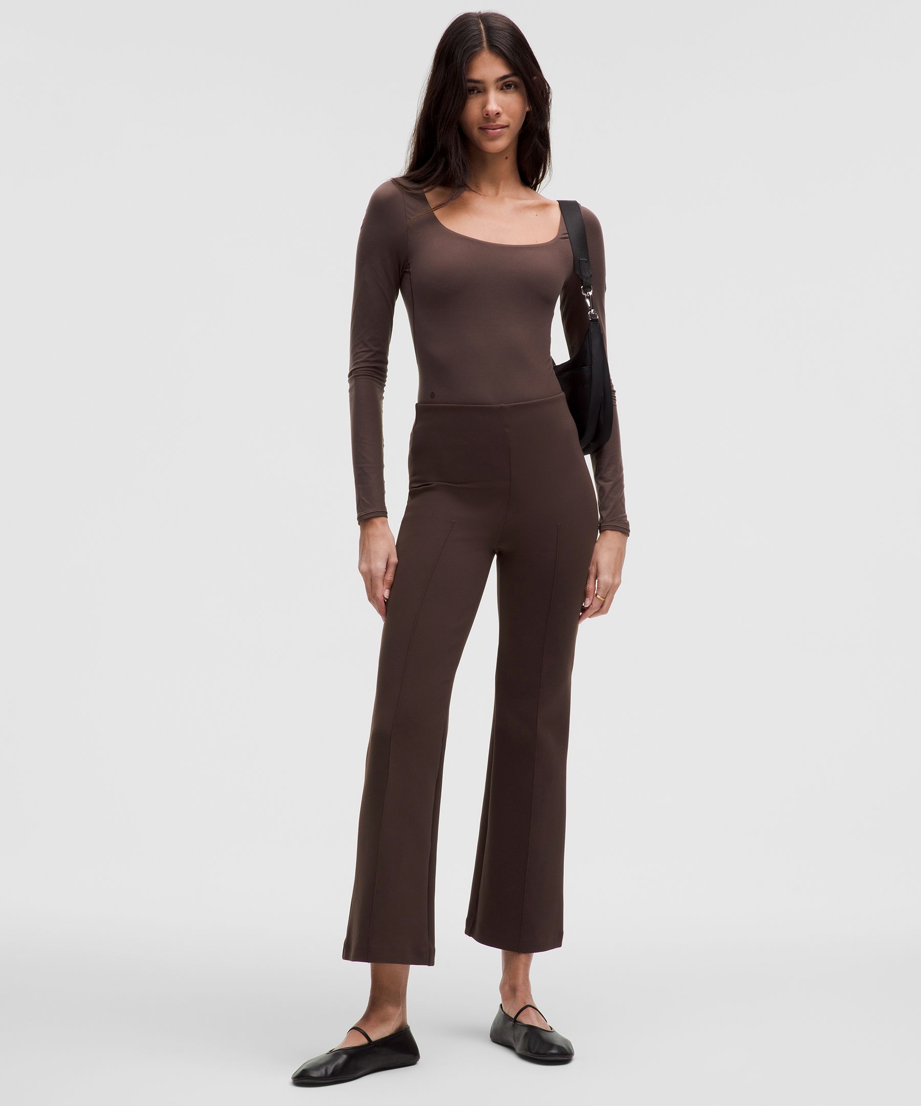 Im wearing the Define Long-Sleeve Bodysuit 6 in the color “espresso”