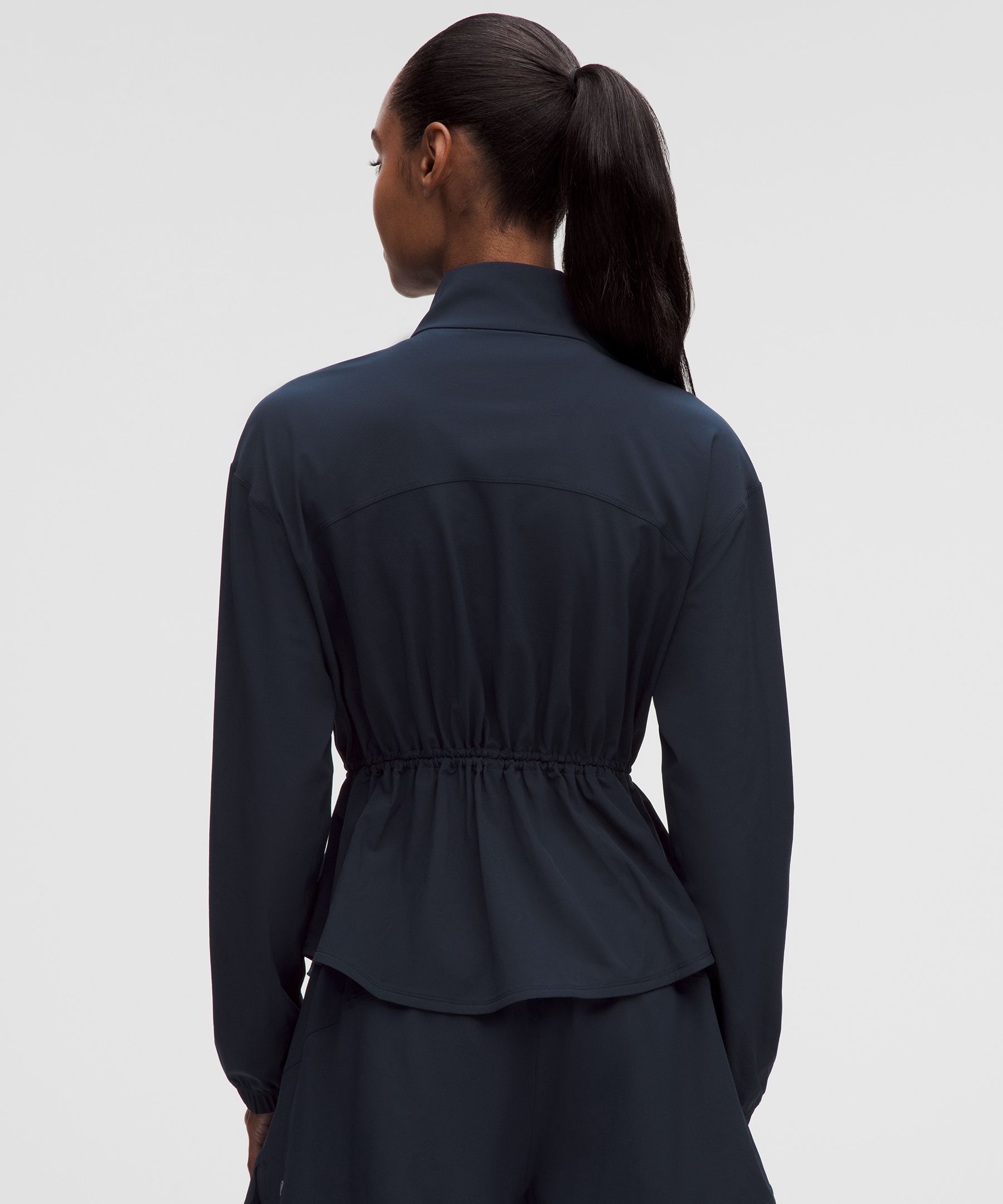 Veste de course &agrave; taille ajustable et protection anti-UV