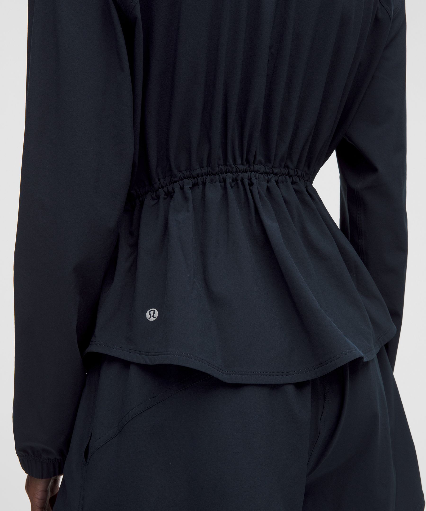 Veste de course &agrave; taille ajustable et protection anti-UV