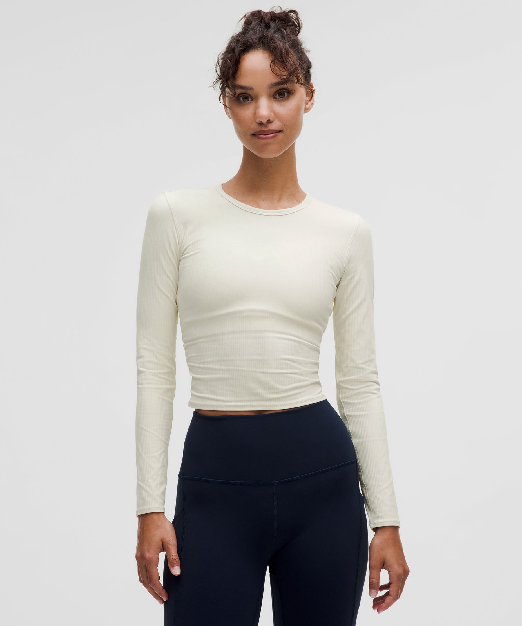 Sitting twist, standing twist, a top with a twist. This version of our ribbed, buttery-soft yoga lon