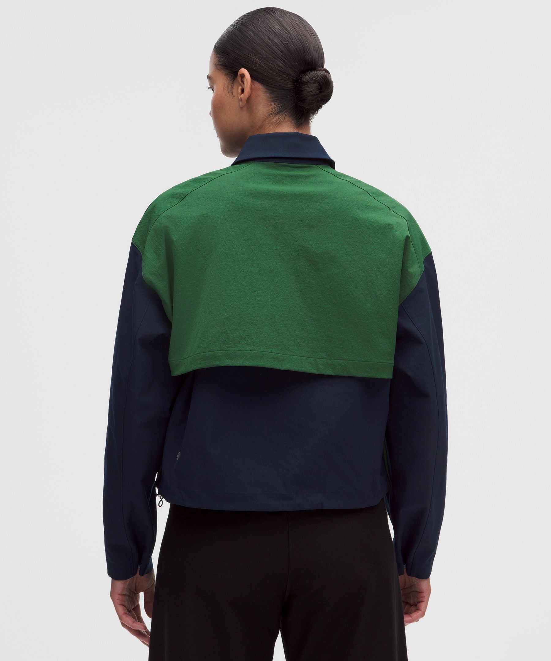 Chaqueta con paneles y cuello para golf