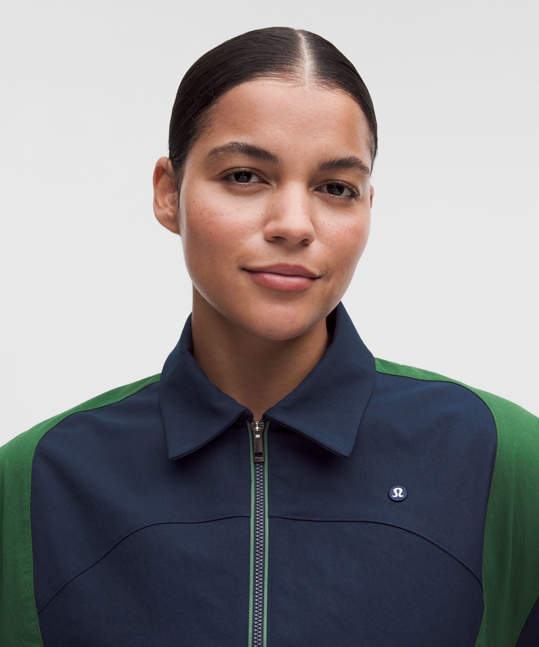 Chaqueta con paneles y cuello para golf