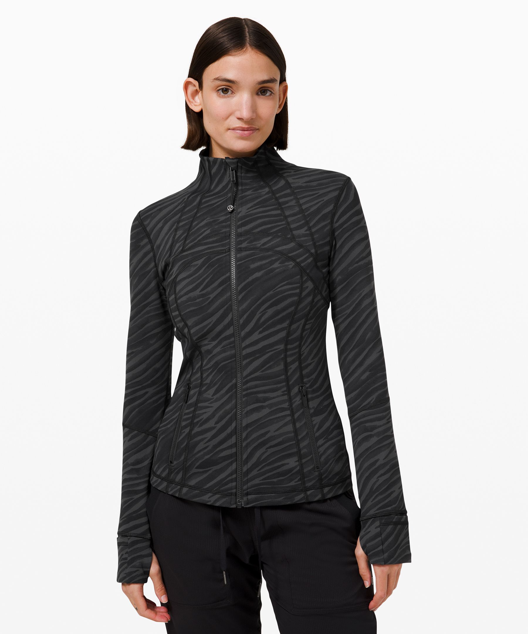 Define thumb-slot zip-fastening jacket