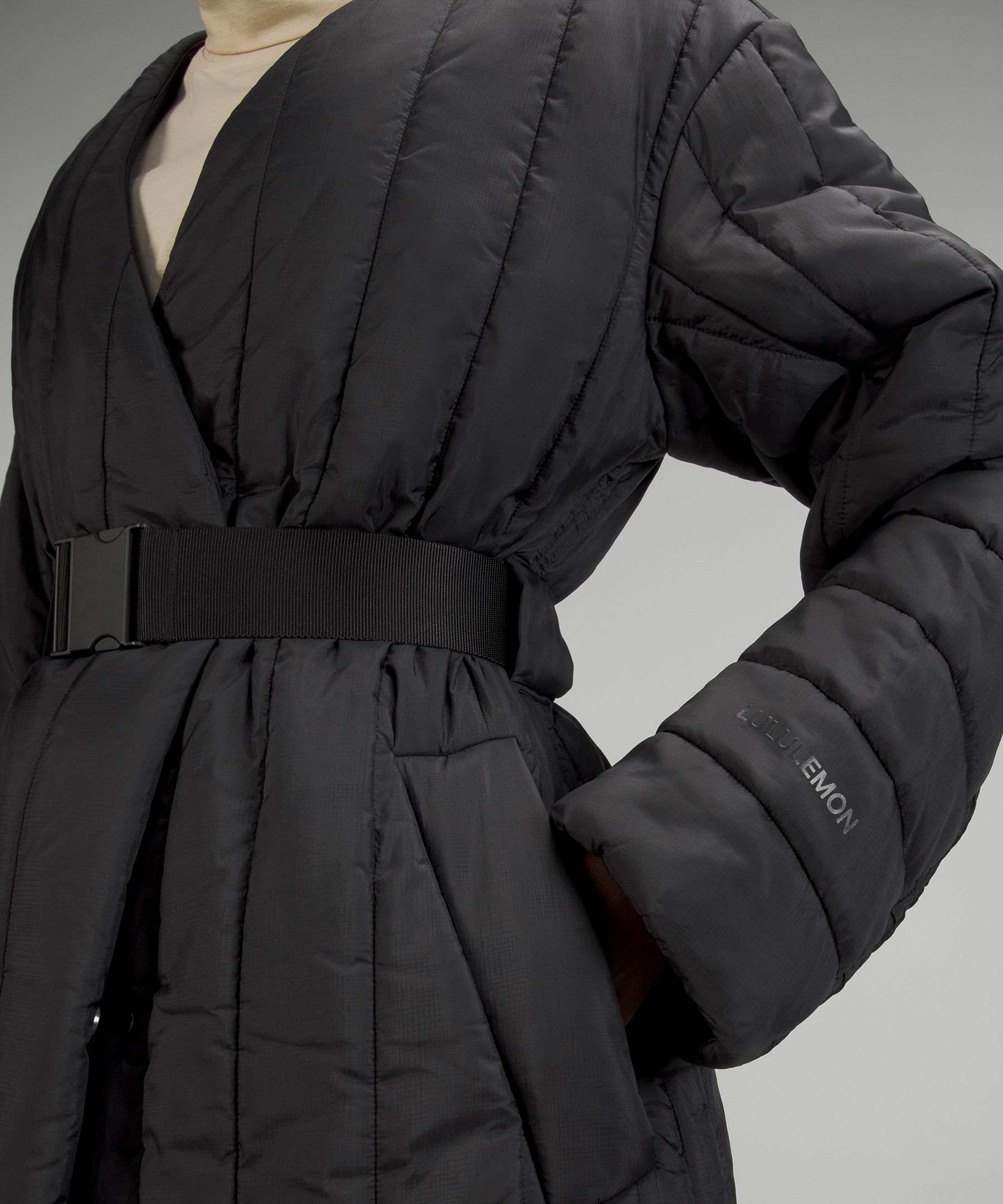 Lululemon jacket womens 4 Black down puffer belted quilted pockets