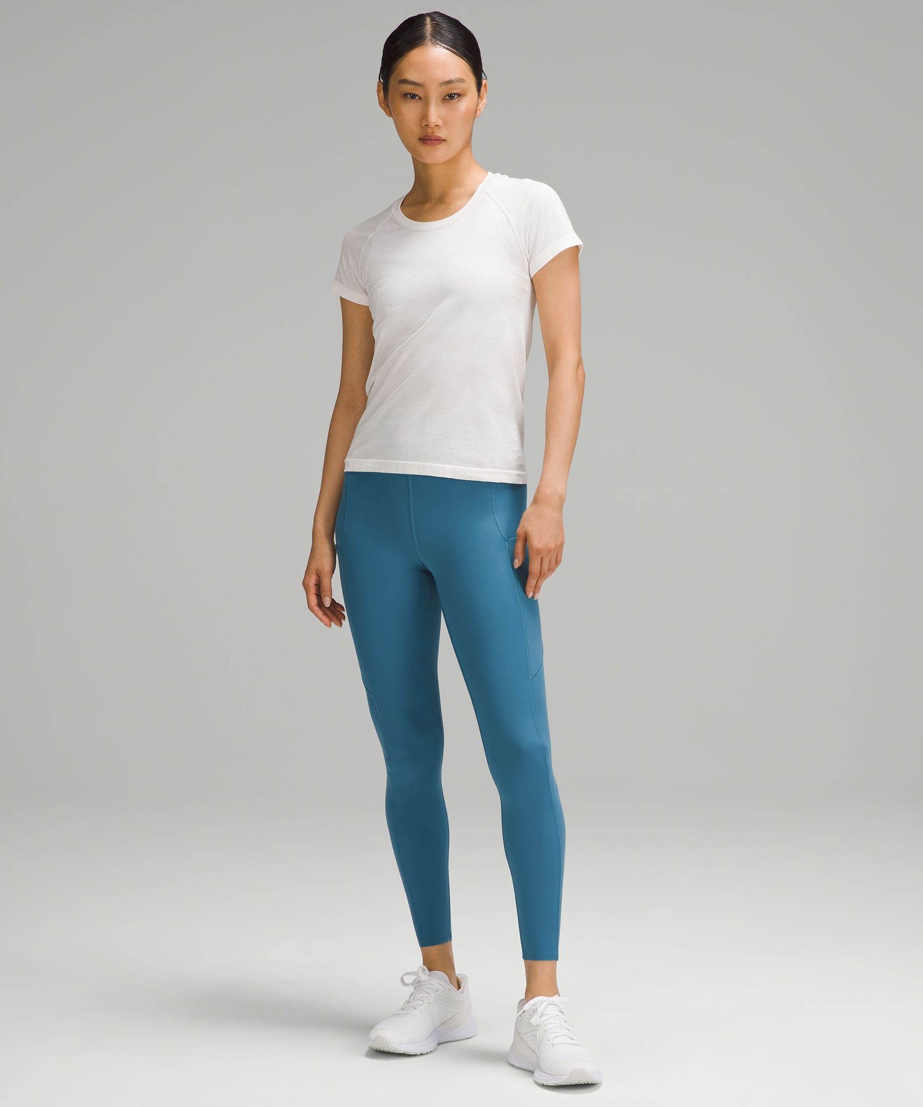 Fast and Free Reflective High-Rise Tight 24