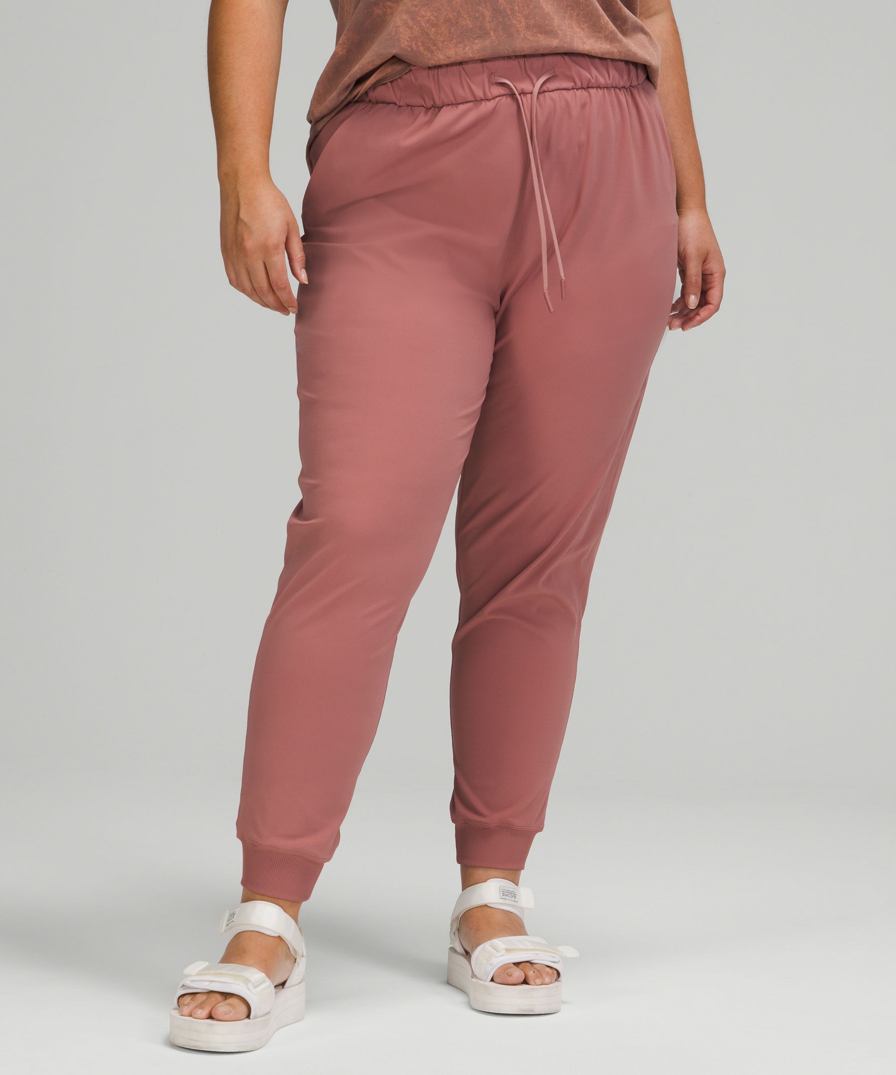 nike sweatpants tan